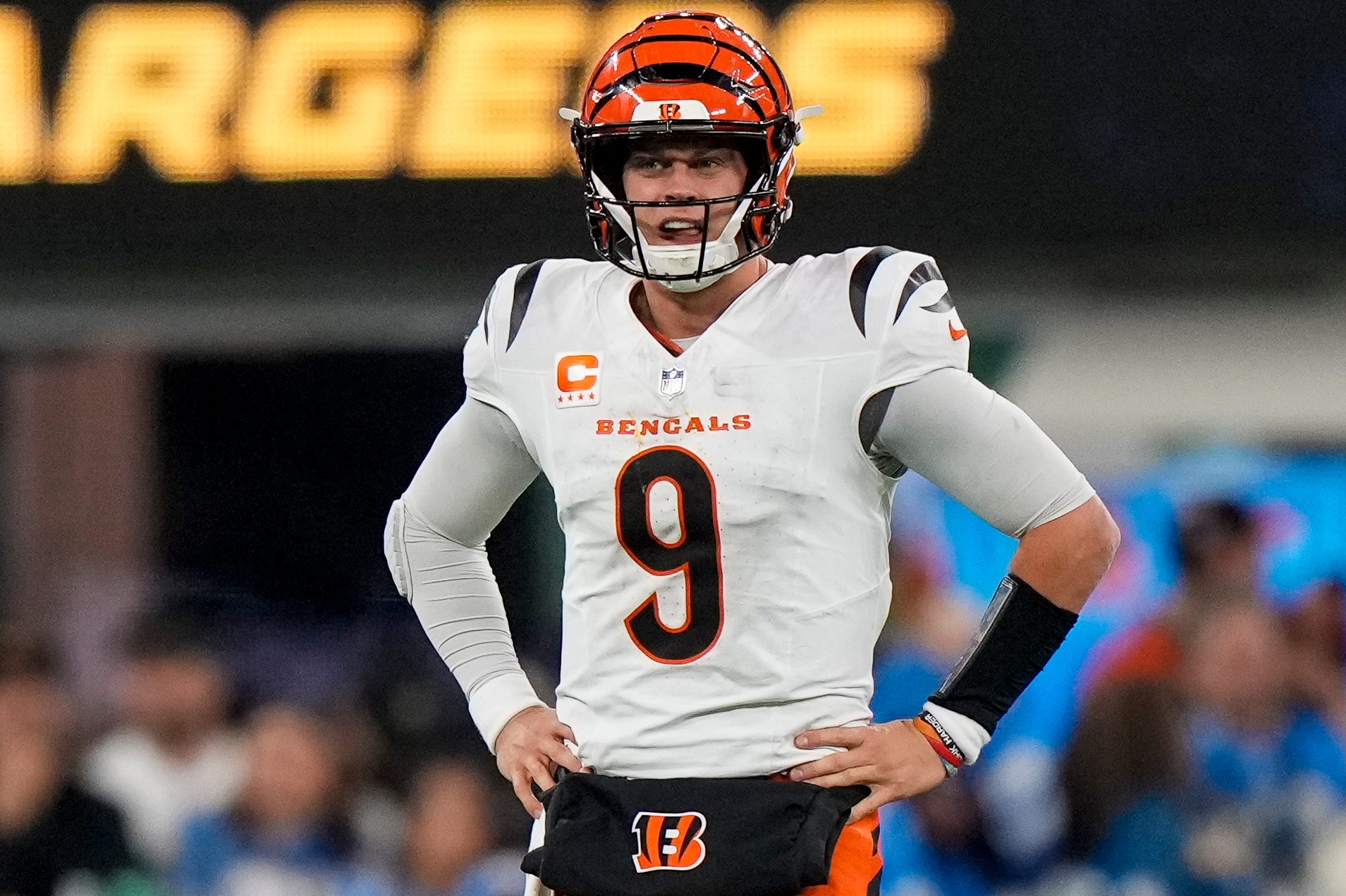 Cincinnati Bengals quarterback Joe Burrow (9) catches his breath after taking a hit in the fourth quarter of the NFL Week 11 game between the Los Angeles Chargers and the Cincinnati Bengals at SoFi Stadium in Inglewood, Calif., on Sunday, Nov. 17, 2024. The Chargers won 34-27.