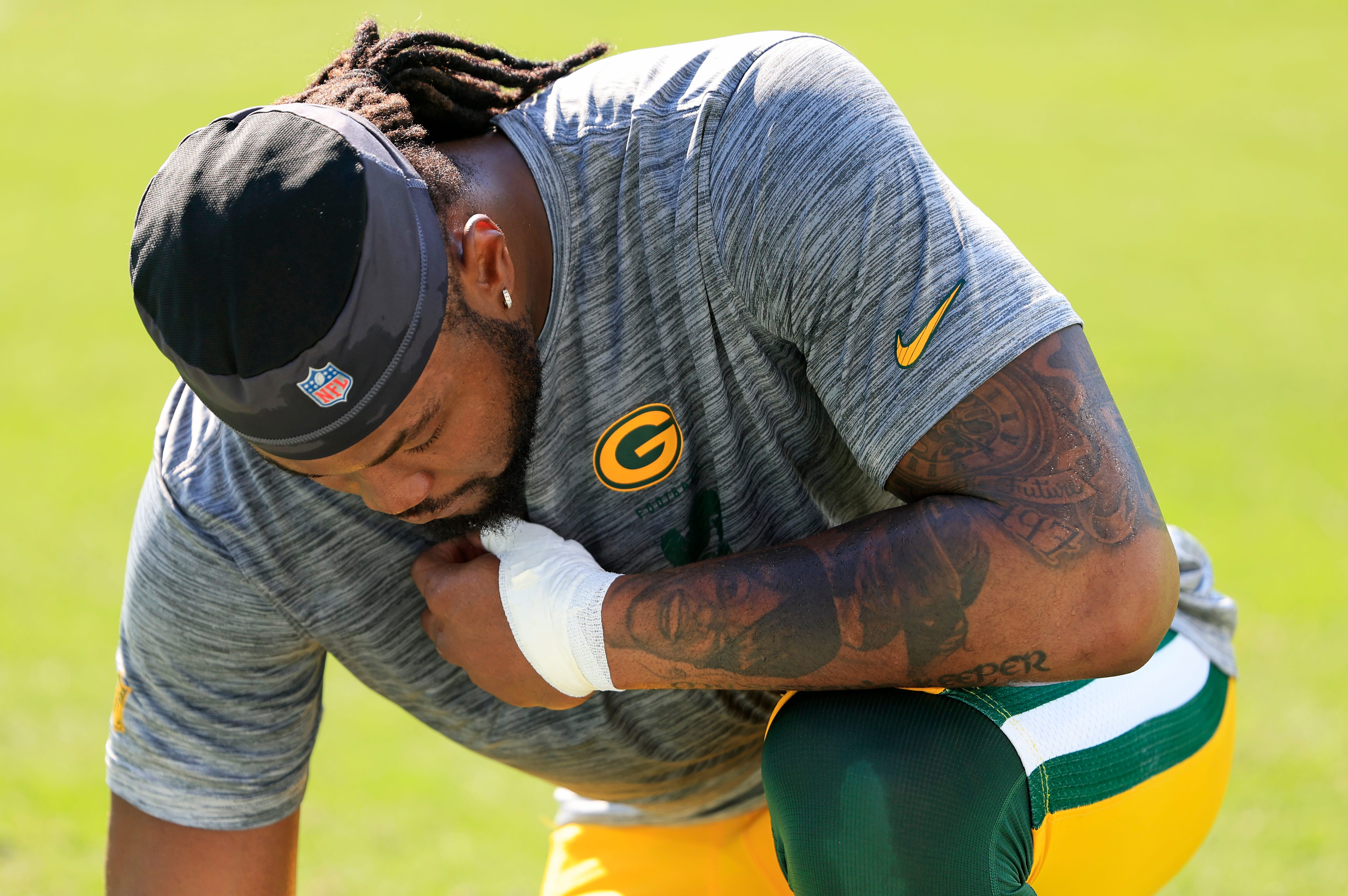 Green Bay Packers defensive end Rashan Gary (52) prays before an NFL football matchup Sunday, Oct. 27, 2024 at EverBank Stadium in Jacksonville, Fla.
