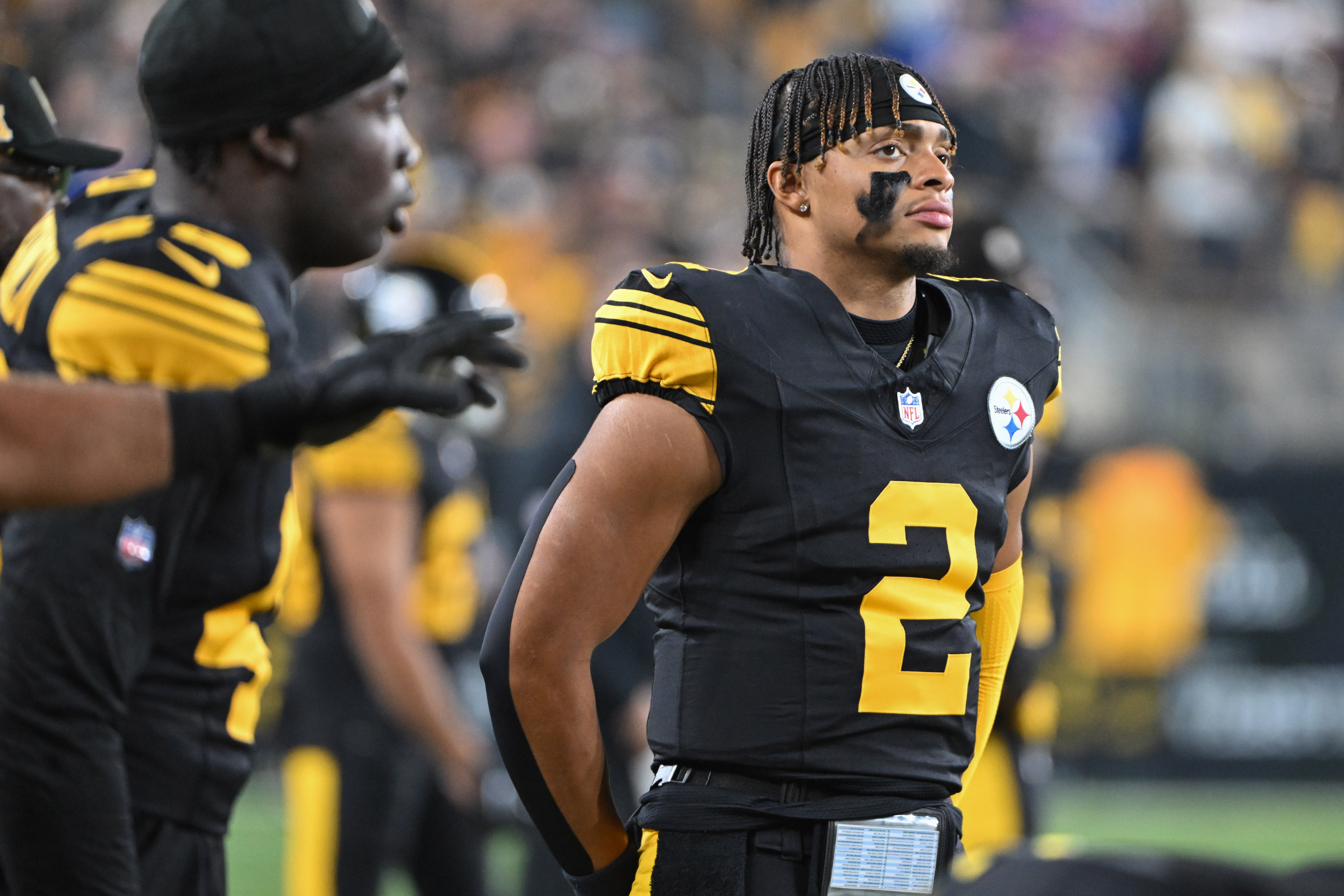 Oct 28, 2024; Pittsburgh, Pennsylvania, USA; Pittsburgh Steelers quarterback Justin Fields (2) watches the action during the first quarter of a game against the New York Giants at Acrisure Stadium.