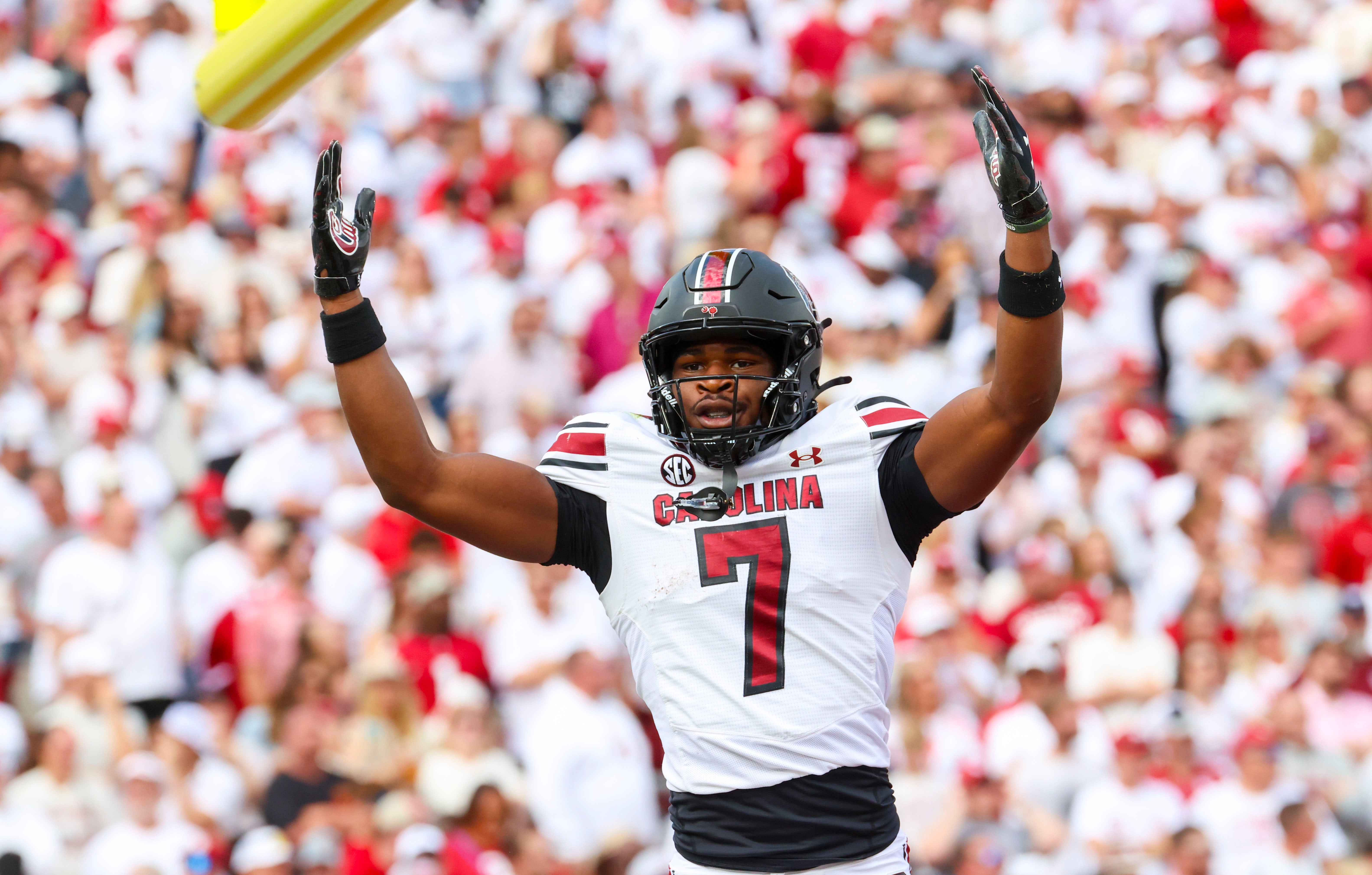 South Carolina Gamecocks defensive back Nick Emmanwori (7) reacts after returning an interception for a touchdown during the first half against the Oklahoma Sooners at Gaylord Family-Oklahoma Memorial Stadium.