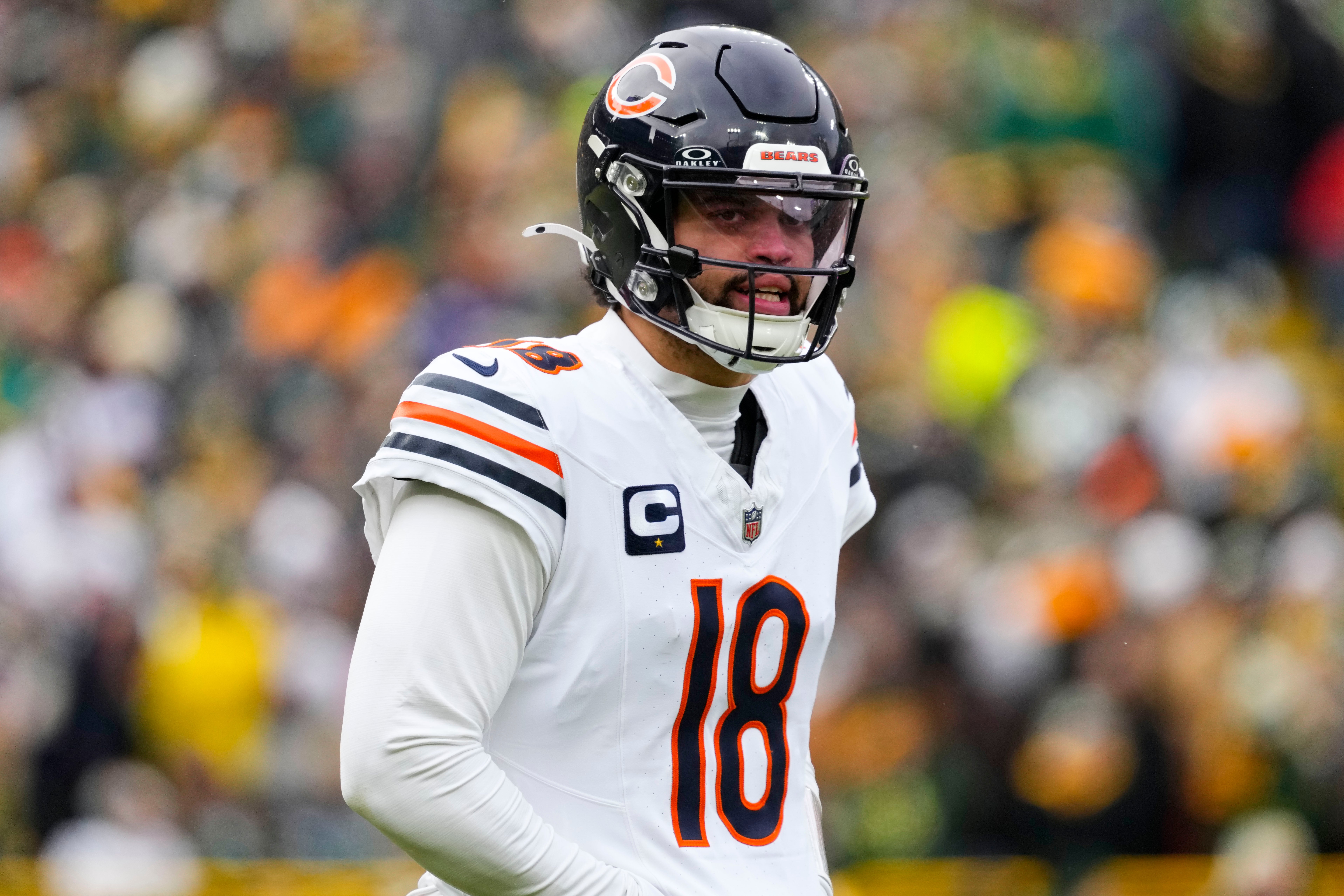 Jan 5, 2025; Green Bay, Wisconsin, USA; Chicago Bears quarterback Caleb Williams (18) during the game against the Chicago Bears at Lambeau Field.
