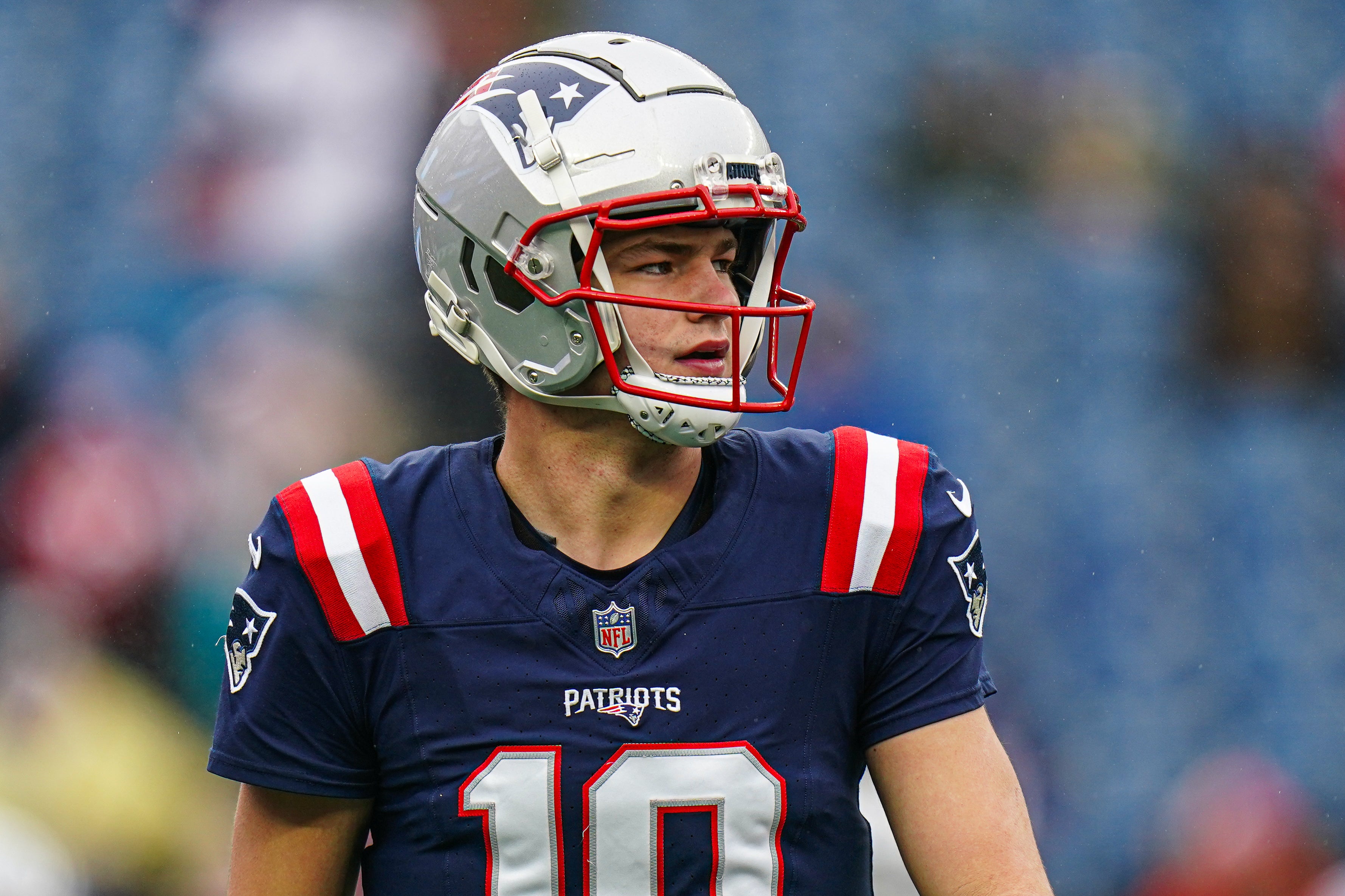 Dec 28, 2024; Foxborough, Massachusetts, USA; New England Patriots quarterback Drake Maye (10) warms up before the start of the game against the Los Angeles Chargers at Gillette Stadium