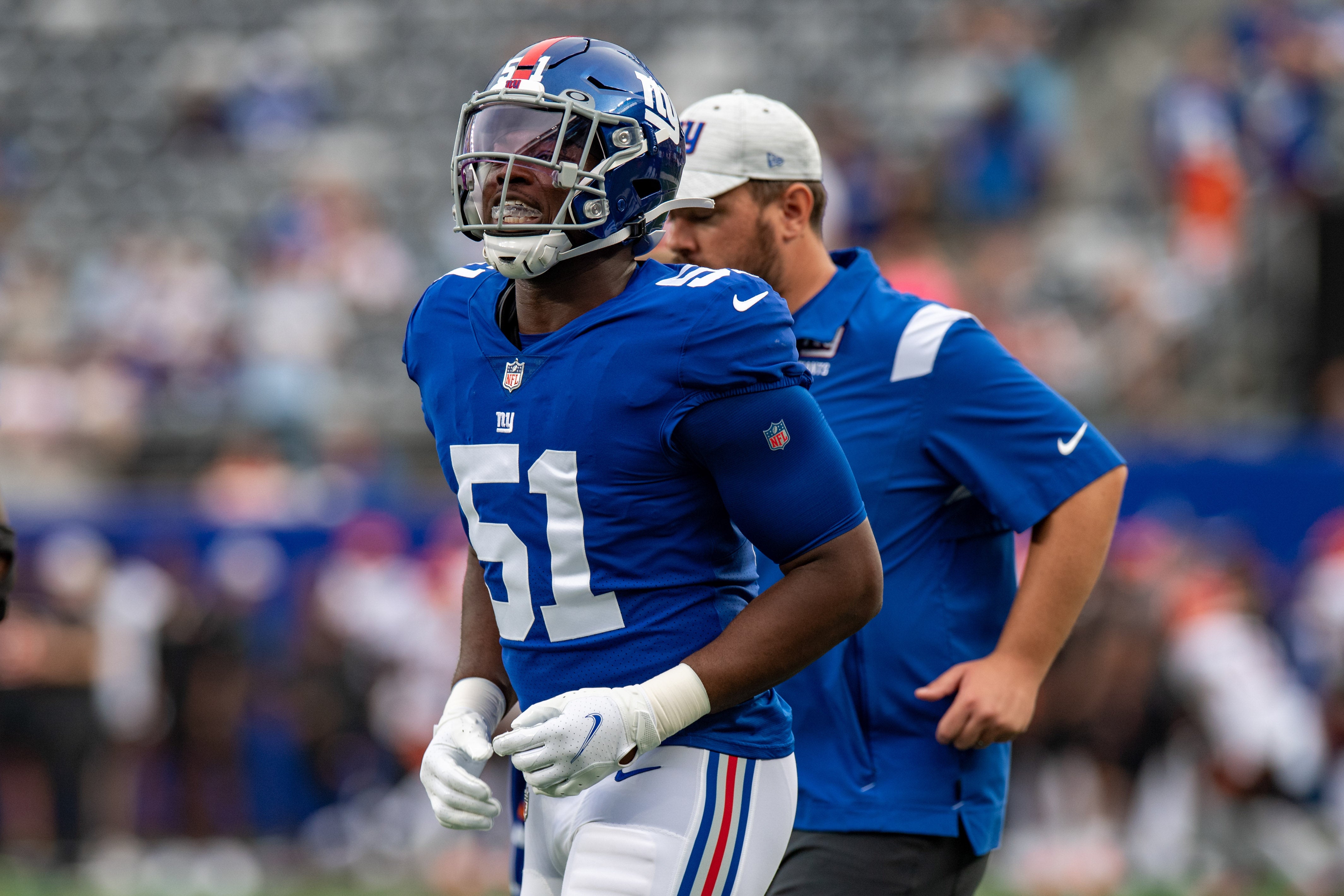 New York Giants linebacker Azeez Ojulari (51) warms up prior to the preseason game against the Cincinnati Bengals at MetLife Stadium.