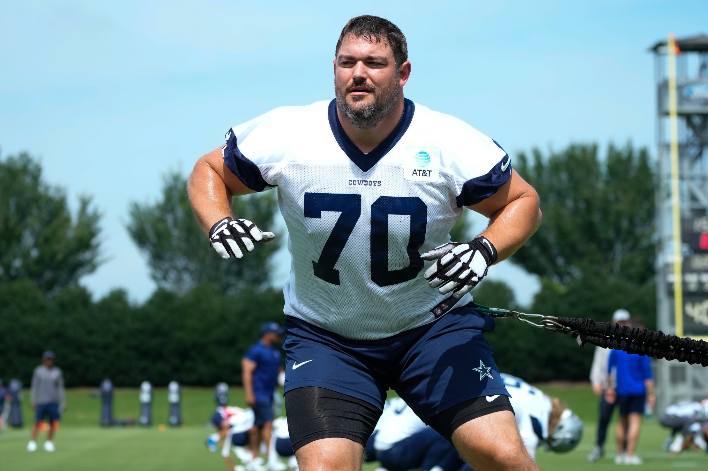Dallas Cowboys tackle Zack Martin (70) warms up during practice at the Ford Center at the Star Training Facility in Frisco, Texas.