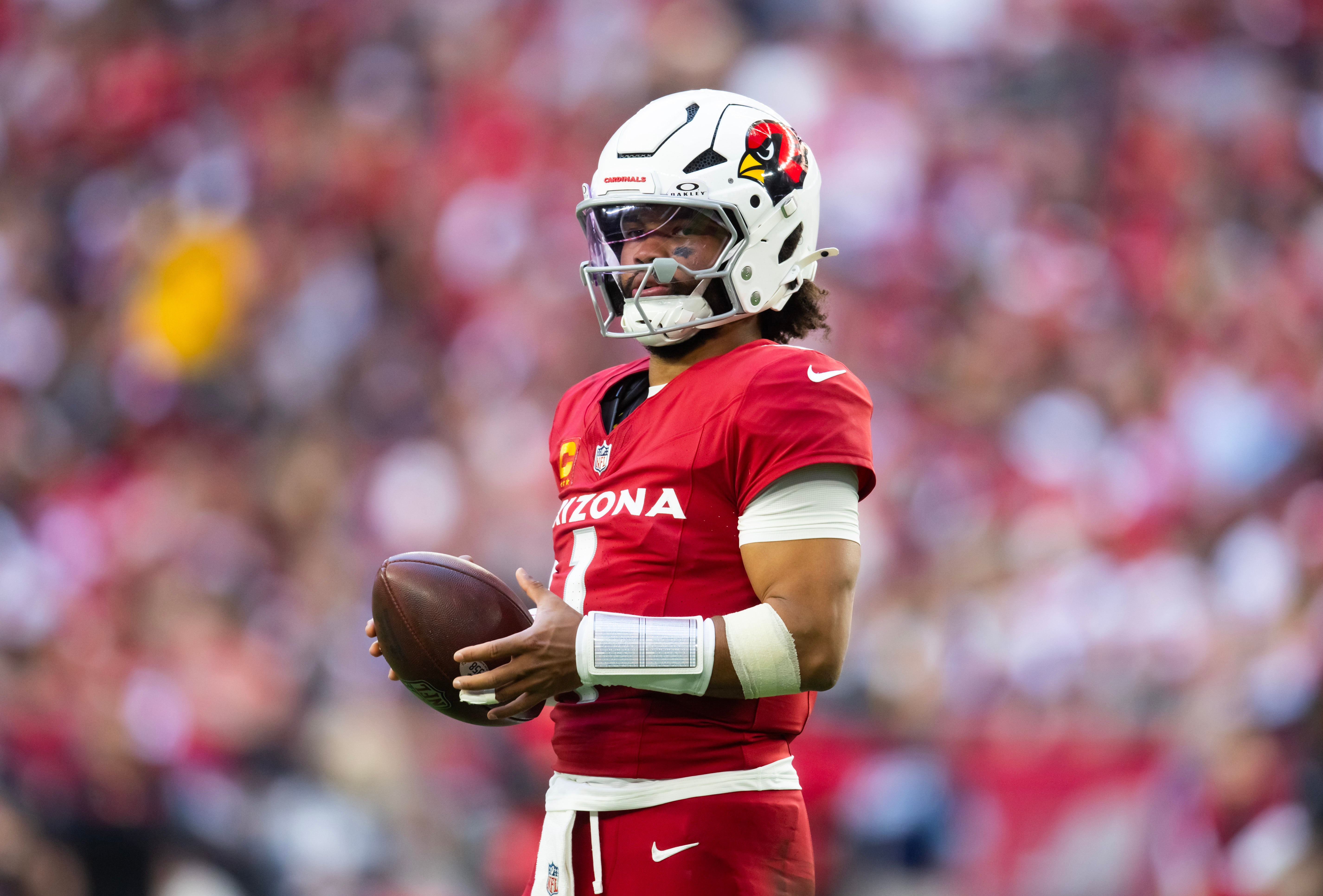 Jan 5, 2025; Glendale, Arizona, USA; Arizona Cardinals quarterback Kyler Murray (1) against the San Francisco 49ers at State Farm Stadium.