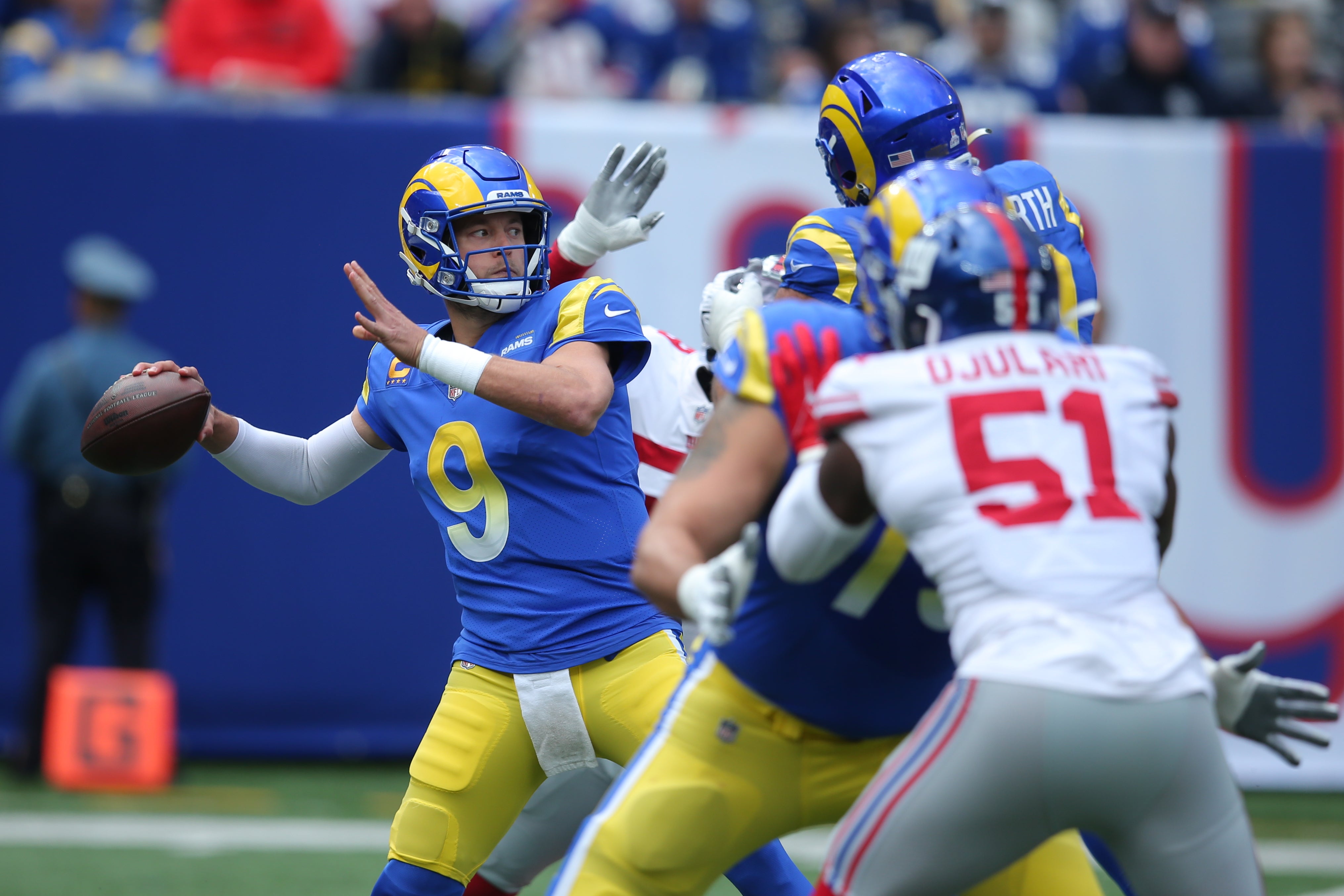 Los Angeles Rams quarterback Matthew Stafford (9) throws a pass against the New York Giants during the first quarter at MetLife Stadium