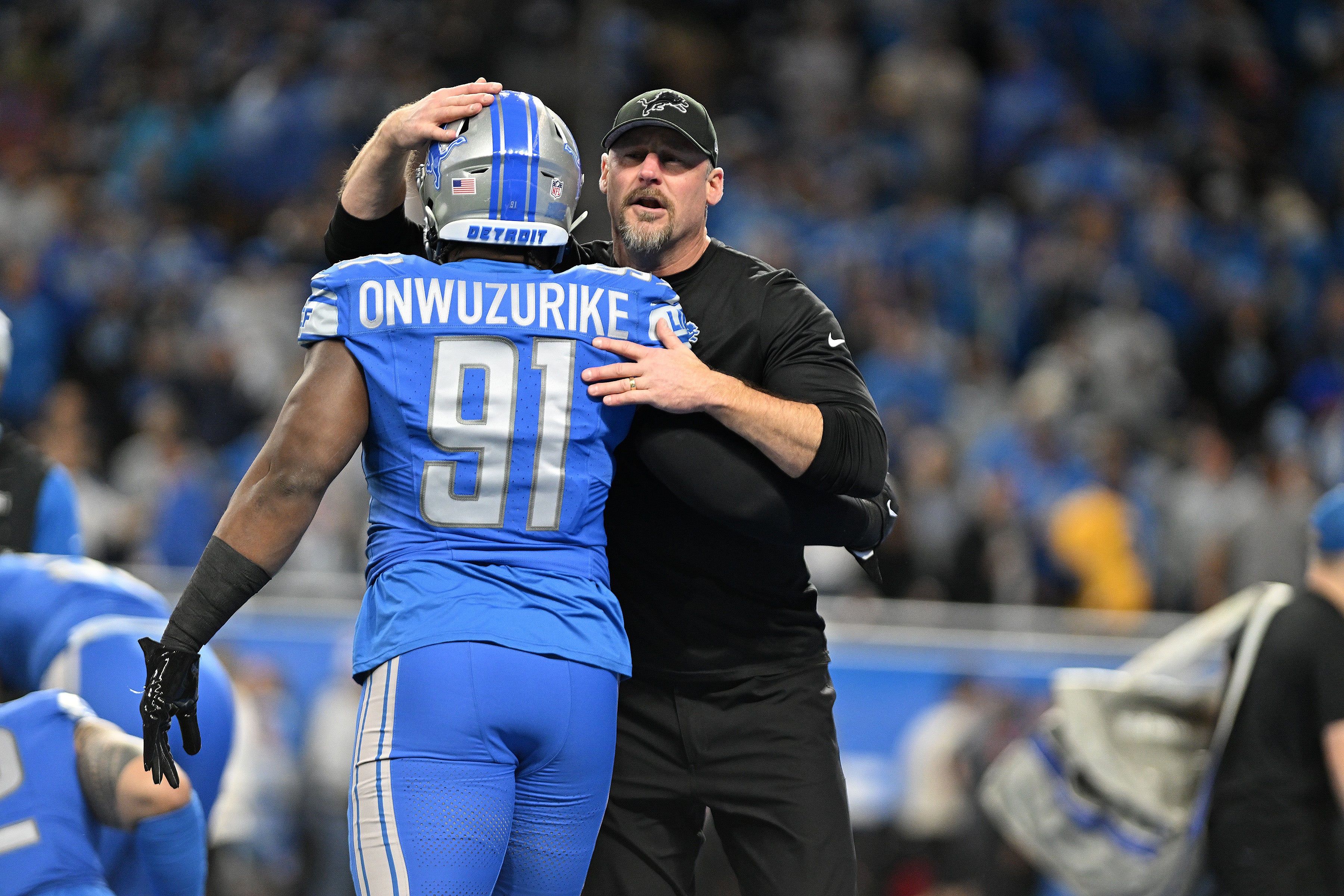 Jan 21, 2024; Detroit, Michigan, USA; Detroit Lions head coach Dan Campbell with defensive end Levi Onwuzurike (91) before a 2024 NFC divisional round game against the Tampa Bay Buccaneers at Ford Field.