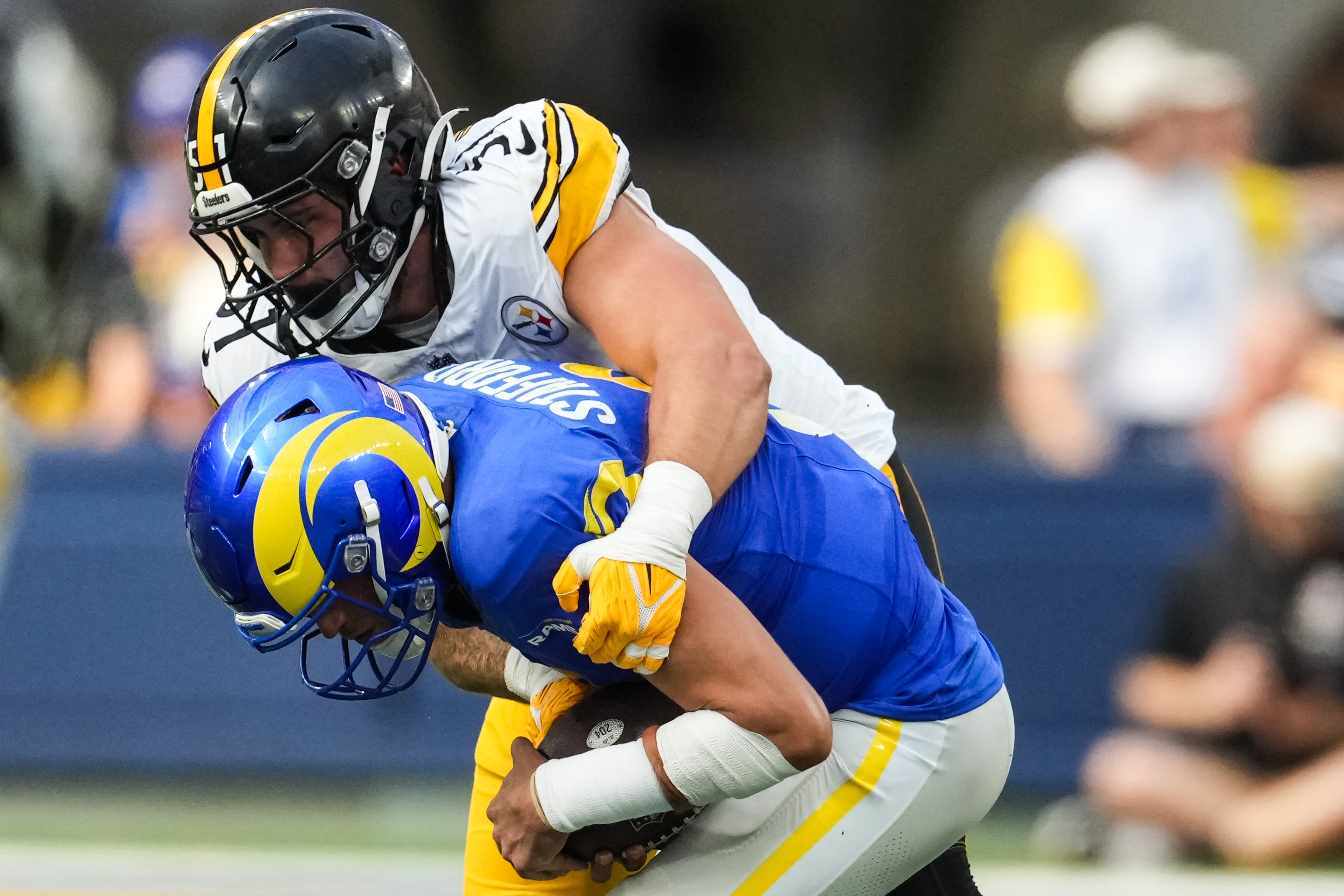 Oct 22, 2023; Inglewood, California, USA; Pittsburgh Steelers linebacker Nick Herbig (51) sacks Los Angeles Rams quarterback Matthew Stafford (9) in the first half at SoFi Stadium.