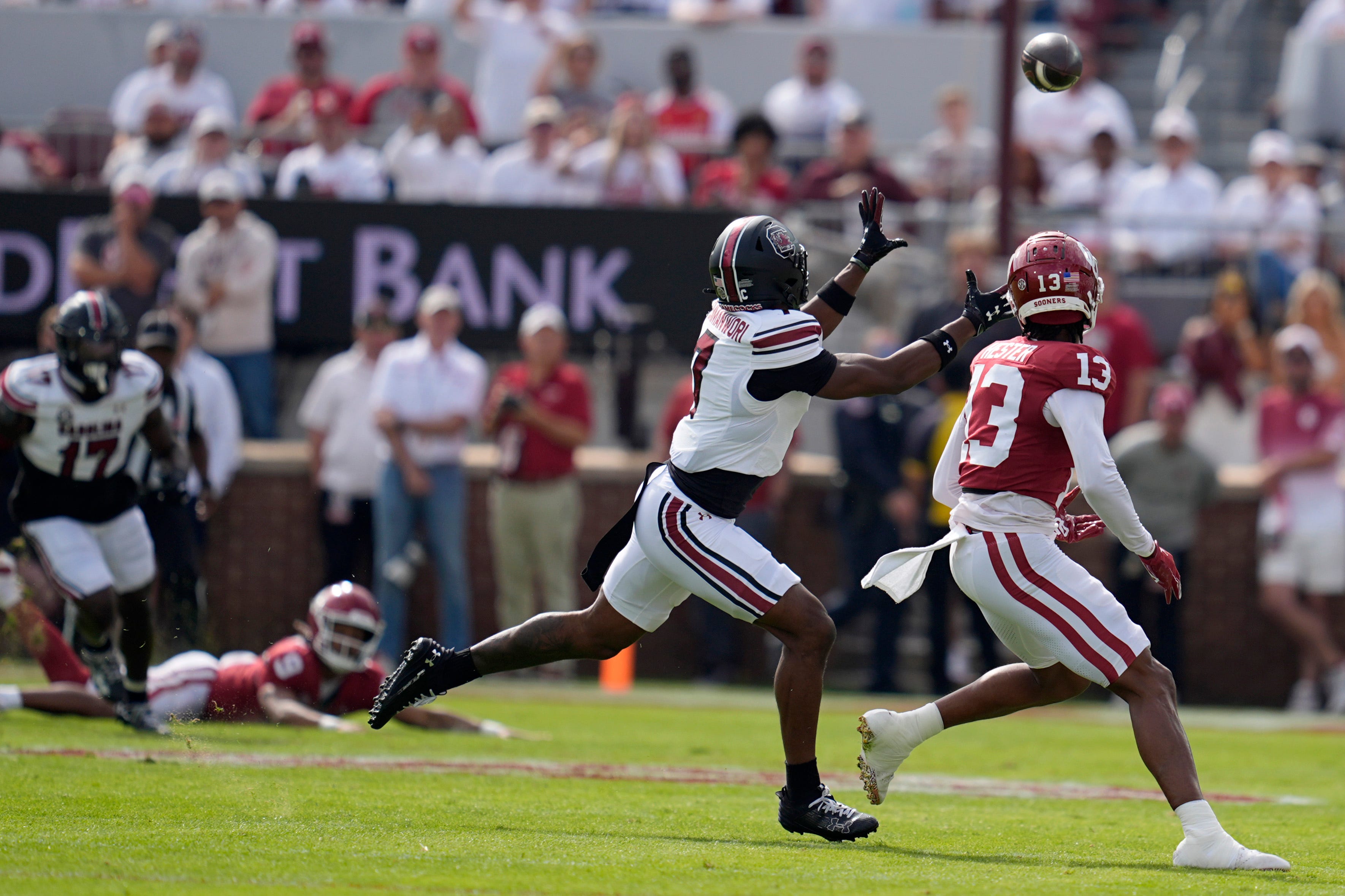 South Carolina Gamecocks defensive back Nick Emmanwori (7) intercepts a pass intended for Oklahoma Sooners wide receiver J.J. Hester (13) during a college football game between the University of Oklahoma Sooners (OU) and the South Carolina Gamecocks at Gaylord Family - Oklahoma Memorial Stadium in Norman, Okla., Saturday, Oct. 19, 2024.