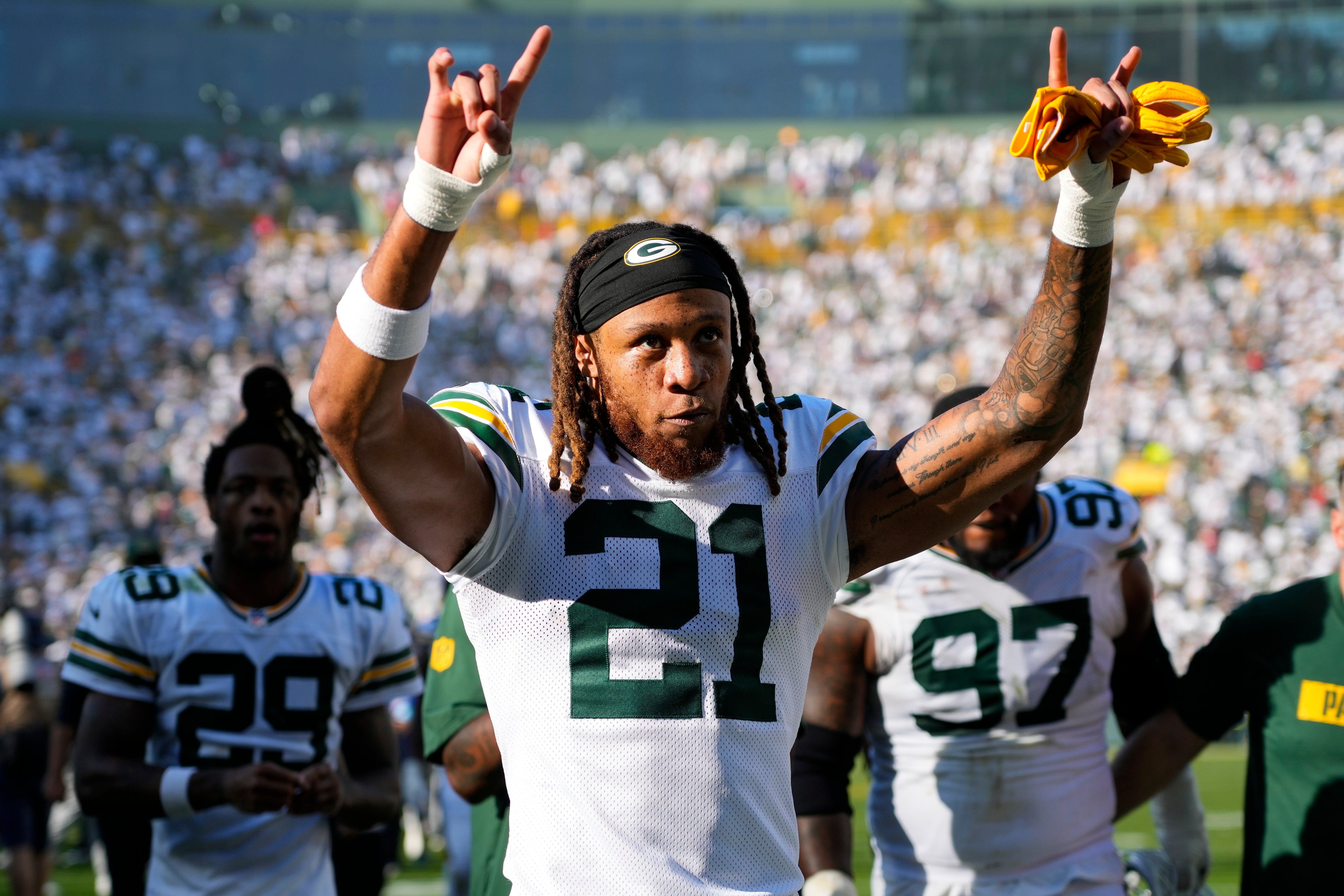 Green Bay Packers cornerback Eric Stokes (21) celebrates as he leaves the field following the game against the Houston Texans at Lambeau Field.