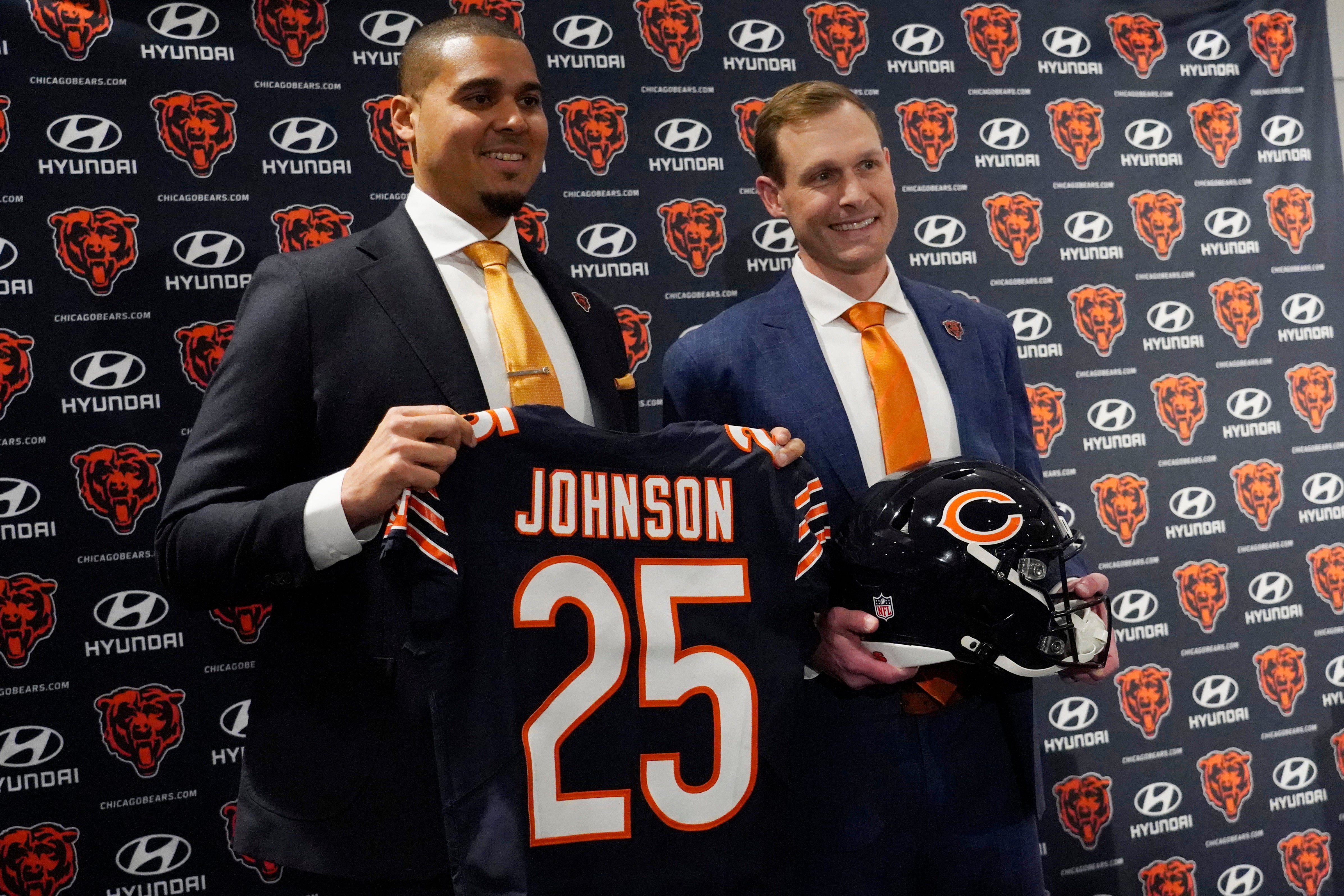 Jan 22, 2025; Lake Forest, IL, USA; Chicago Bears new head coach Ben Johnson (right) with general manager Ryan Poles pose for photos after a press conference introducing him at PNC Center.