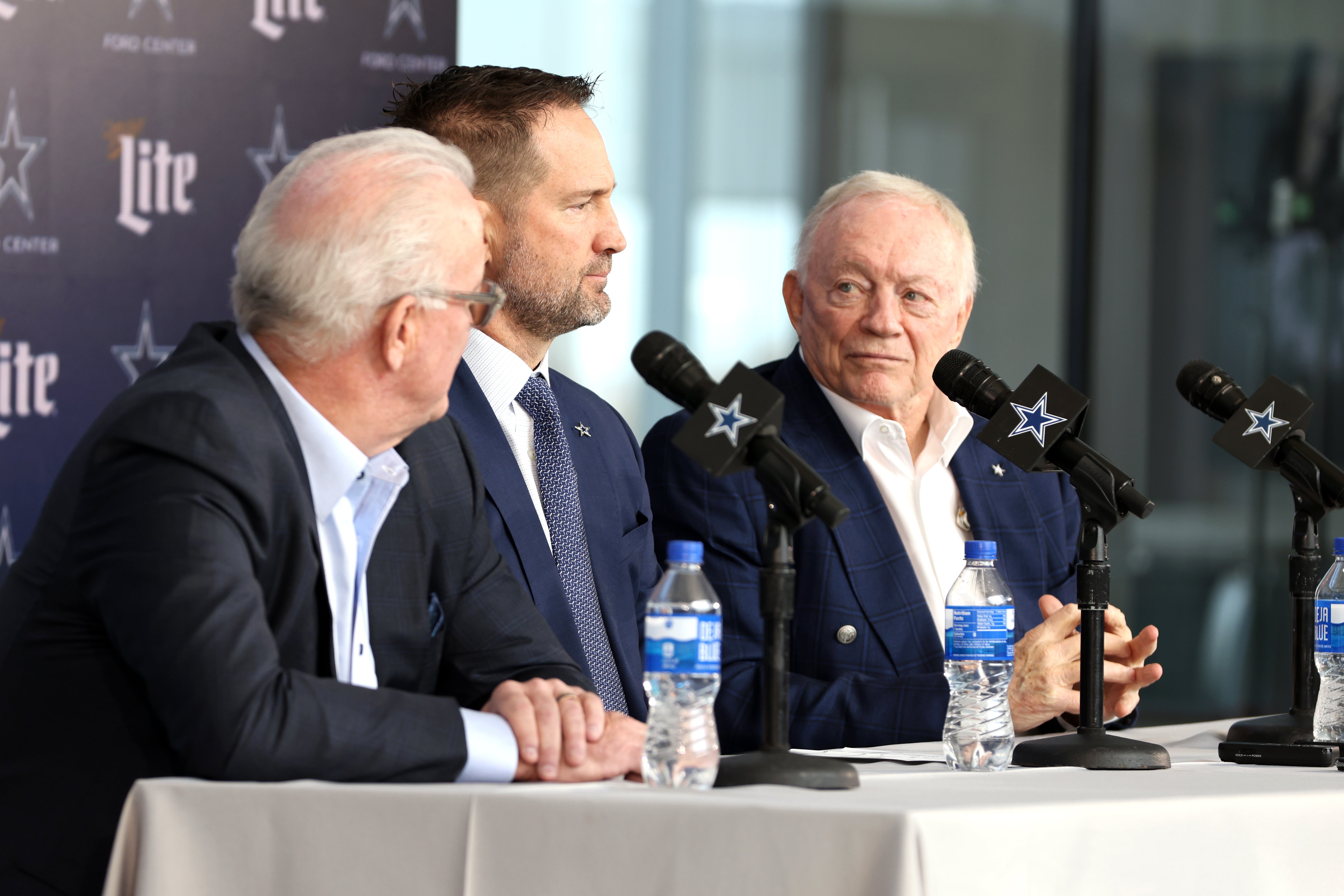 Dallas Cowboys CEO Stephen Jones, head coach Brian Schottenheimer and owner Jerry Jones speak to the media at a press conference at the Star.