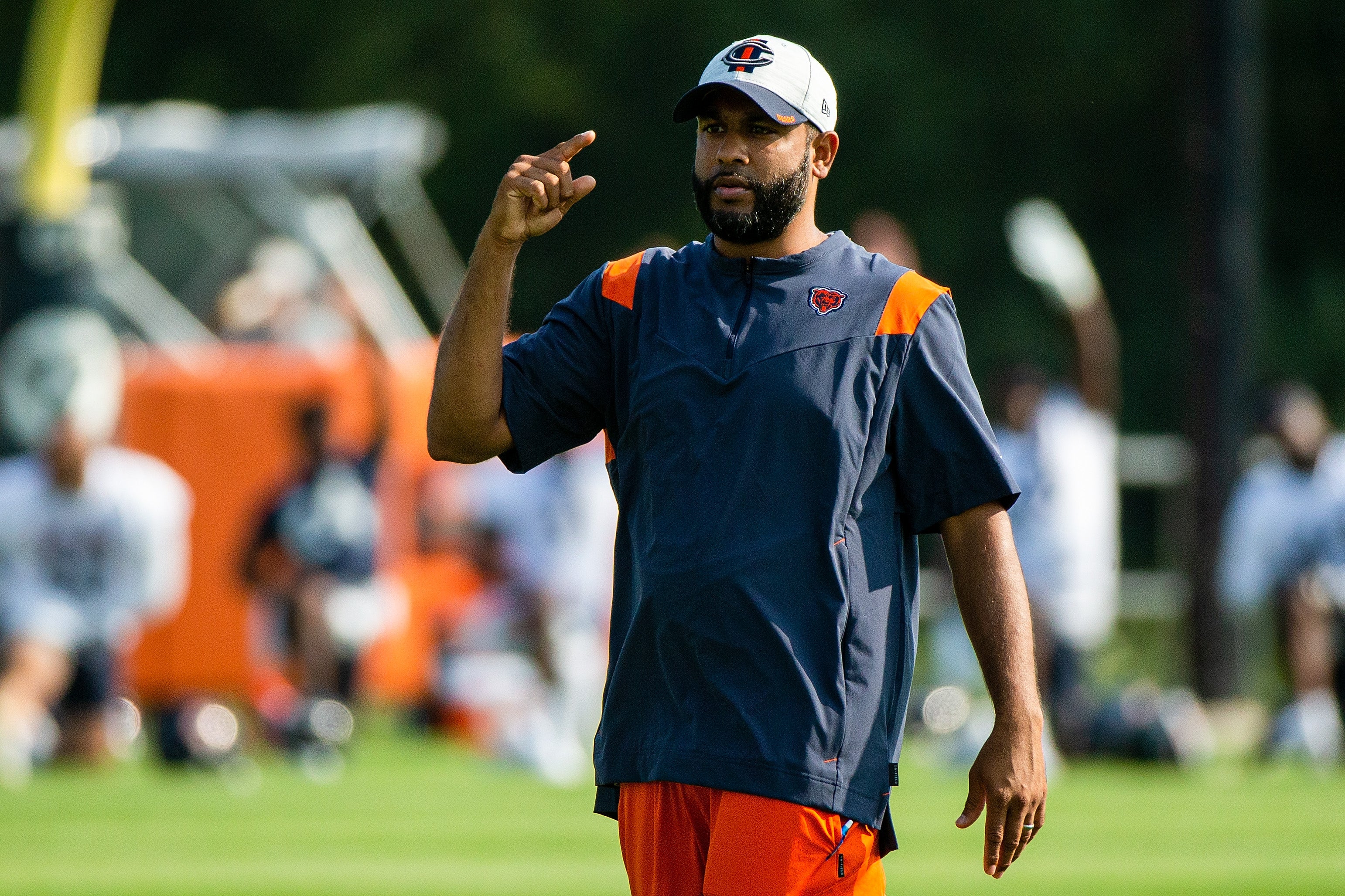 Jul 29, 2021; Lake Forest, IL, USA; Chicago Bears defensive coordinator Sean Desai gestures while walking on the field during a Chicago Bears training camp session at Halas Hall.
