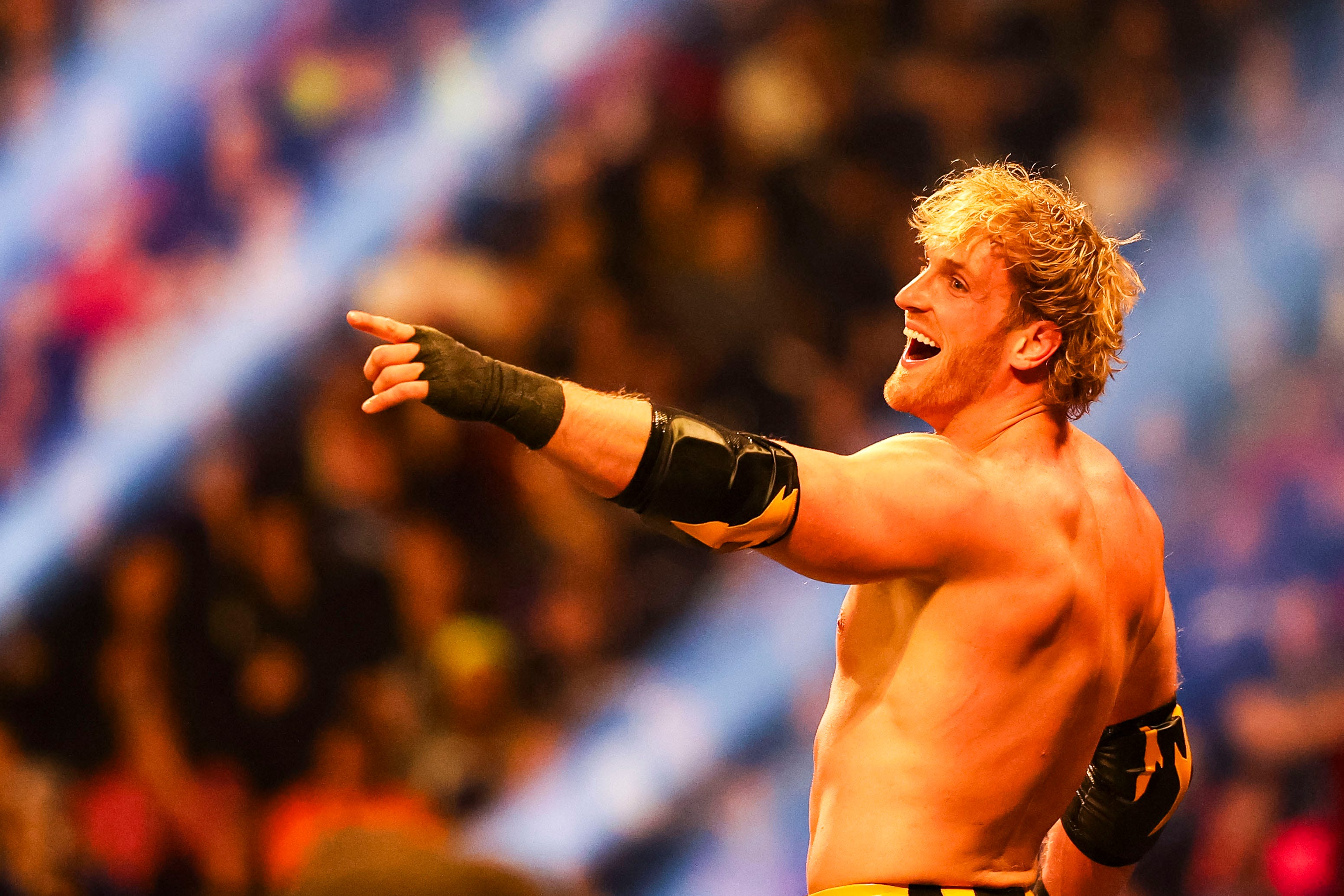 Logan Paul celebrates Saturday, Feb. 1, 2025, during the WWE Royal Rumble at Lucas Oil Stadium in Indianapolis.