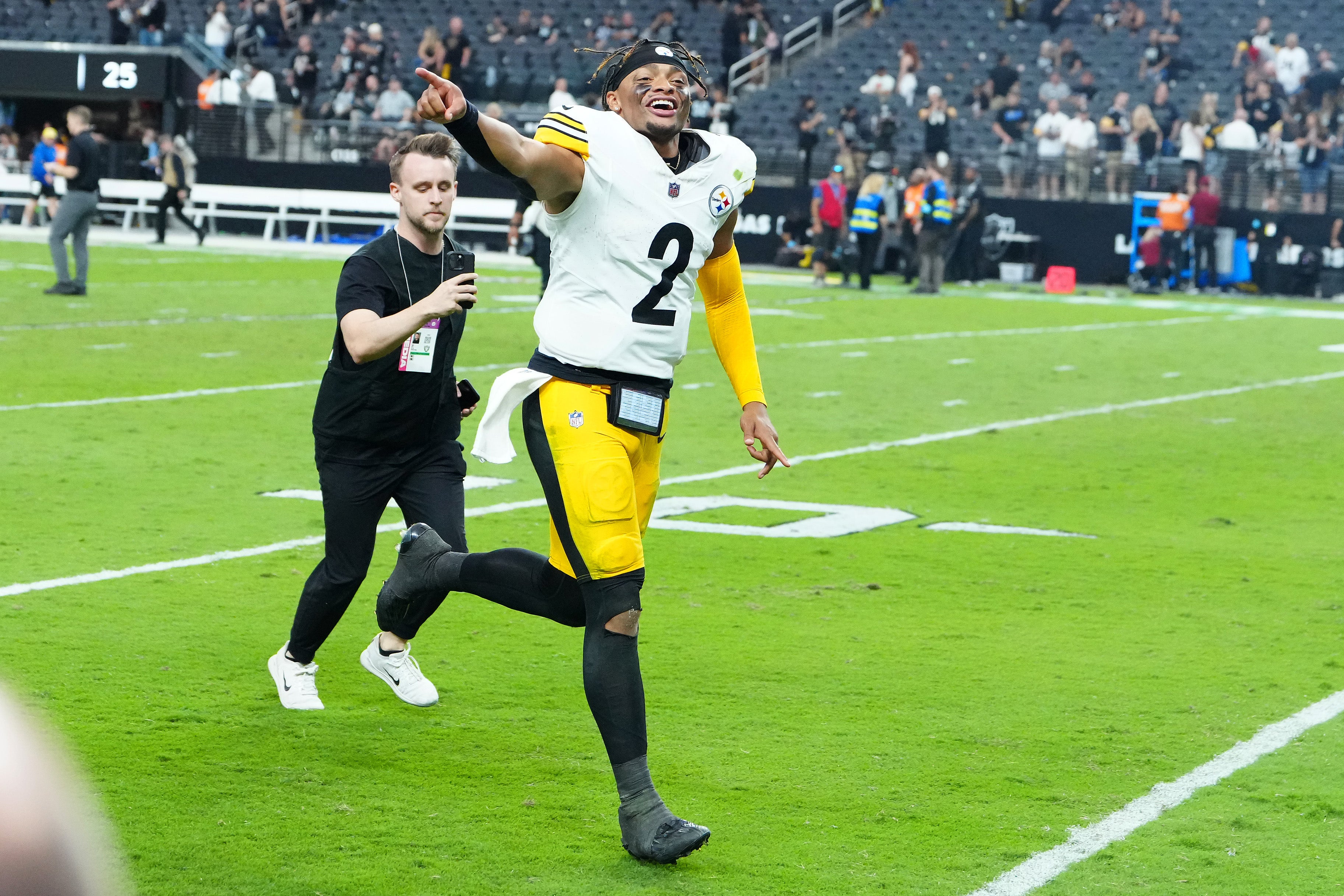 Pittsburgh Steelers quarterback Justin Fields (2) runs off the field after the Steelers defeated the Las Vegas Raiders 32-13 at Allegiant Stadium.