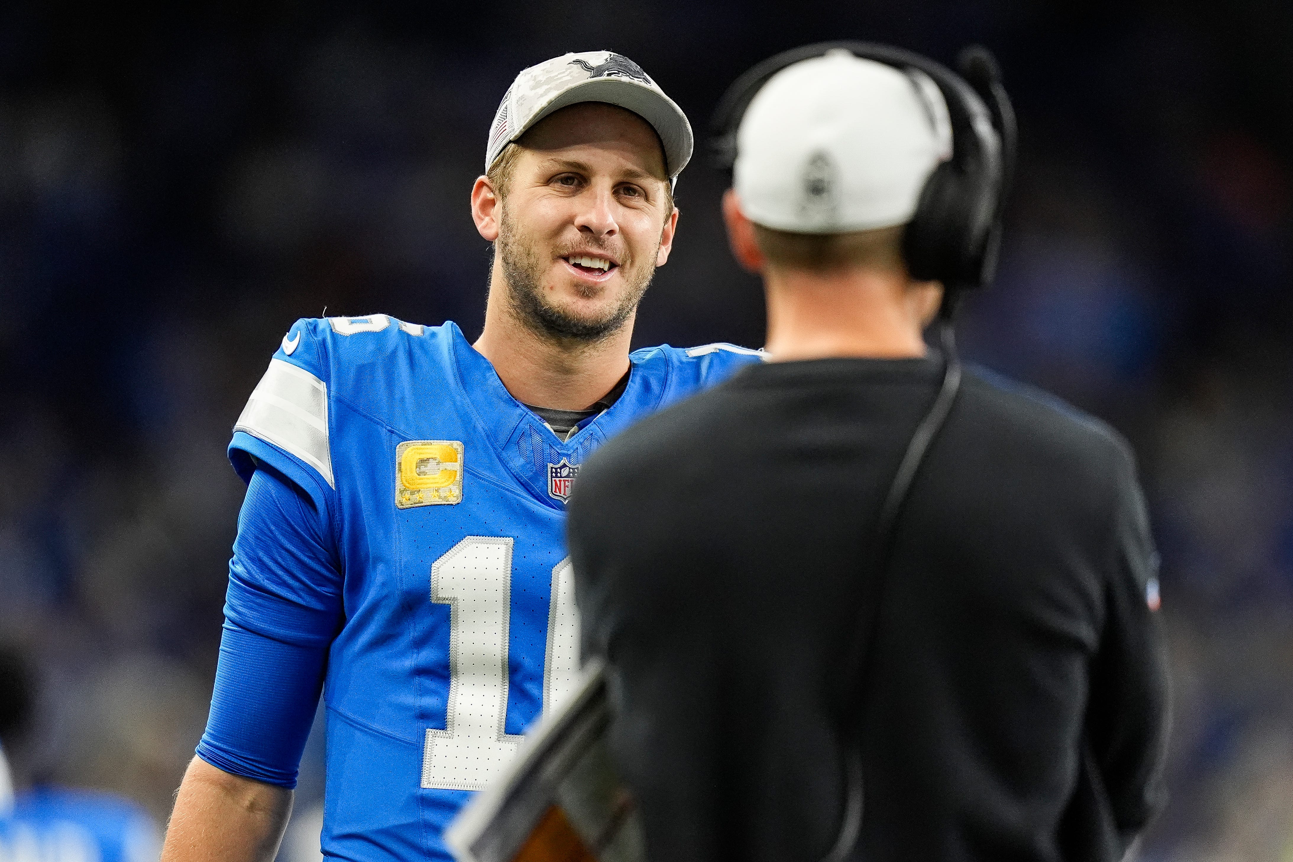 Detroit Lions quarterback Jared Goff (16) talks to offensive coordinator Ben Johnson on the sideline during the second half against Jacksonville Jaguars at Ford Field in Detroit on Sunday, Nov. 17, 2024.