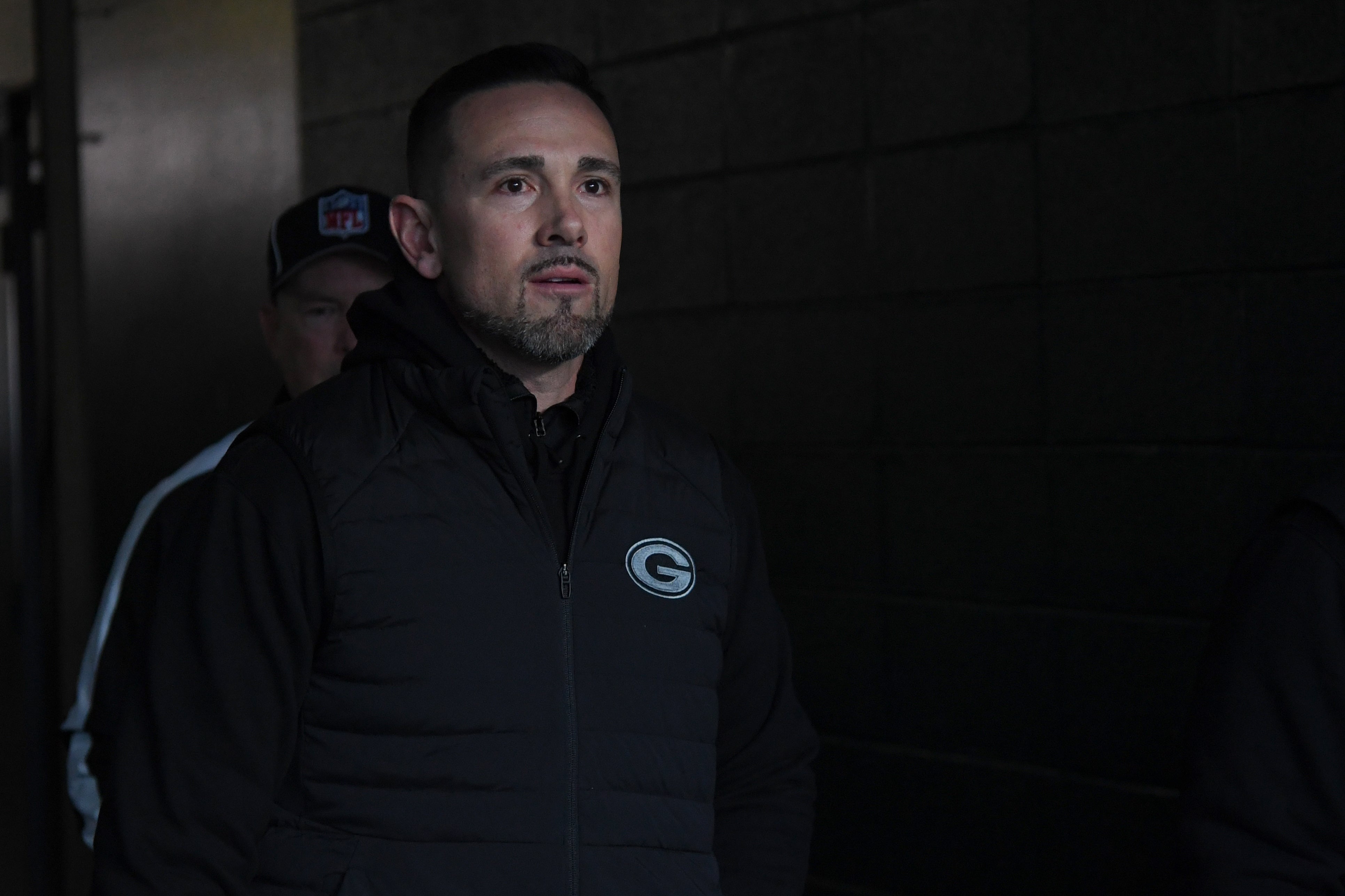 Green Bay Packers head coach Matt LaFleur walks to the field against the Philadelphia Eagles in an NFC wild card game at Lincoln Financial Field.