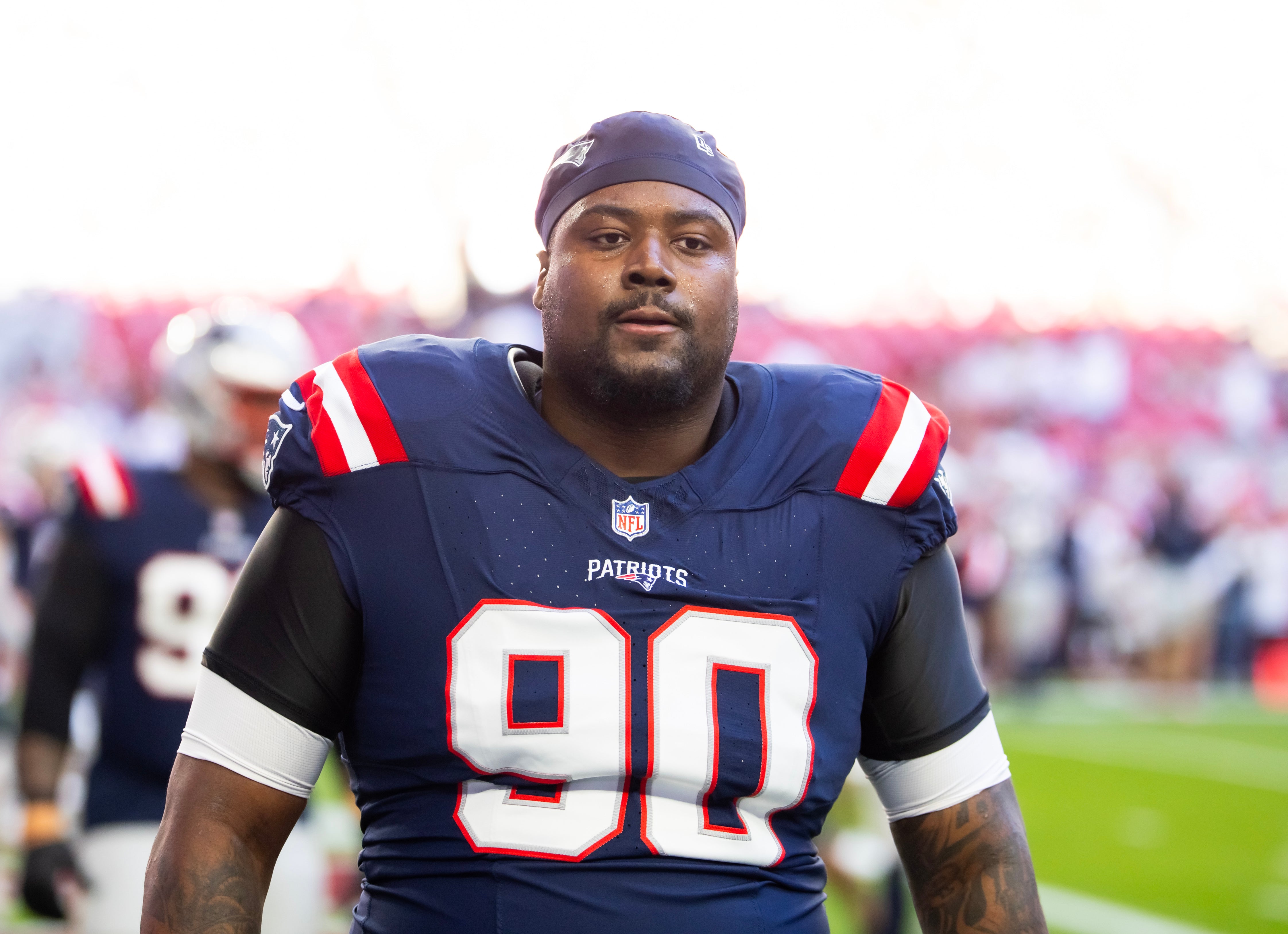 Dec 15, 2024; Glendale, Arizona, USA; New England Patriots defensive tackle Christian Barmore (90) against the Arizona Cardinals at State Farm Stadium.
