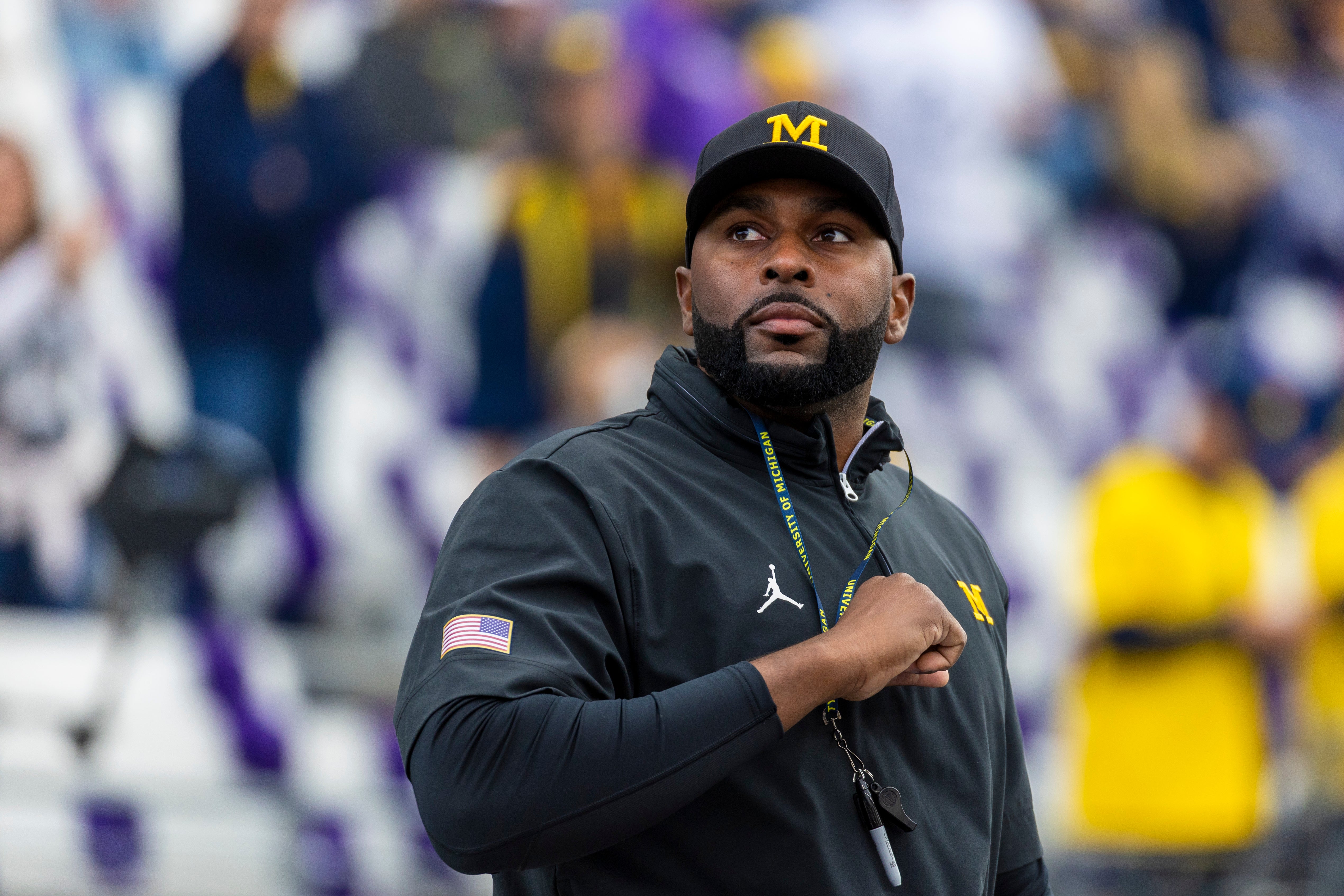 Oct 5, 2024; Seattle, Washington, USA; Michigan Wolverines head coach Sherrone Moore walks out of the locker room during pregame warmups against the Washington Huskies at Alaska Airlines Field at Husky Stadium.