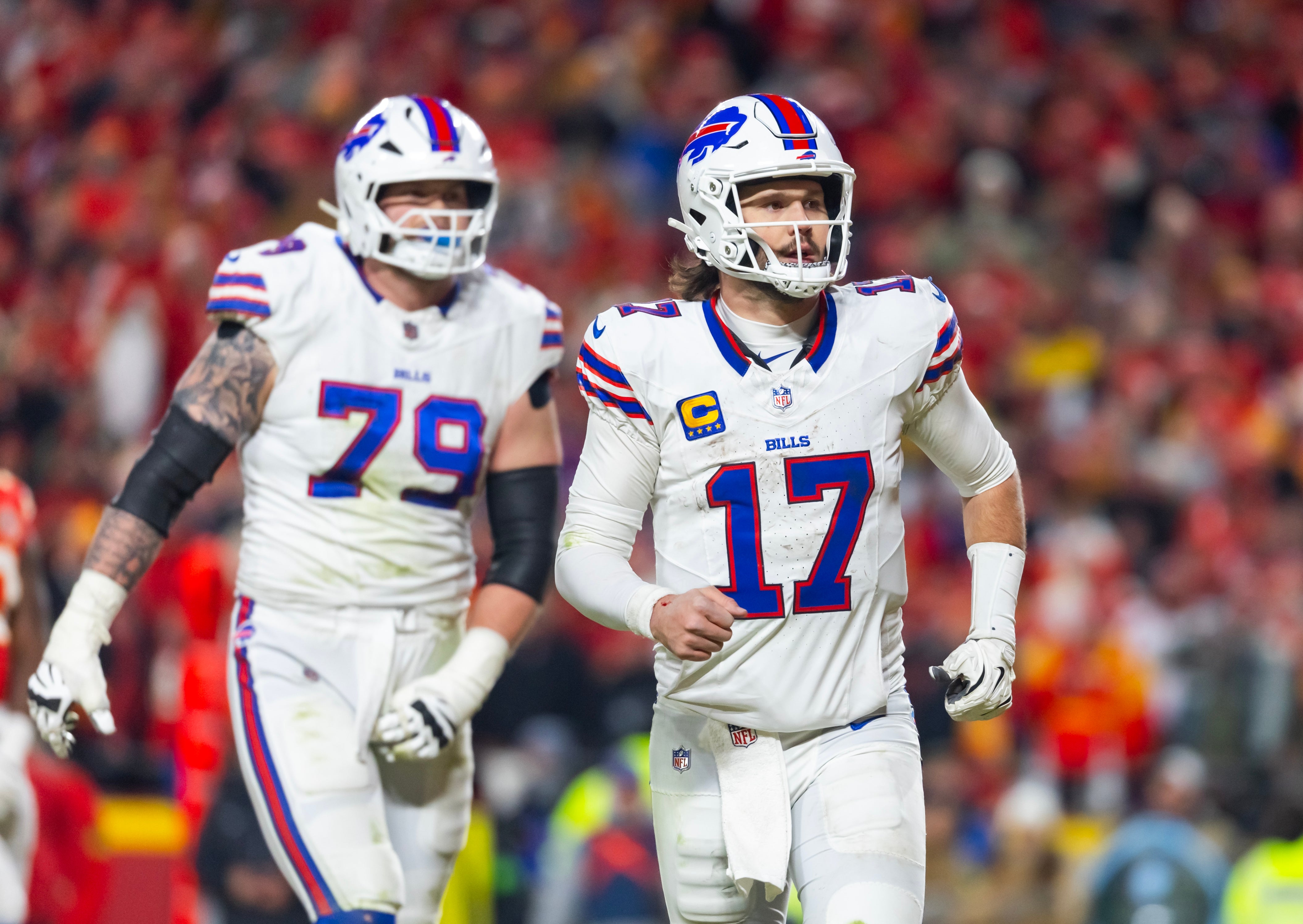 Jan 26, 2025; Kansas City, MO, USA; Buffalo Bills quarterback Josh Allen (17) and offensive tackle Spencer Brown (79) against the Kansas City Chiefs during the AFC Championship game at GEHA Field at Arrowhead Stadium.