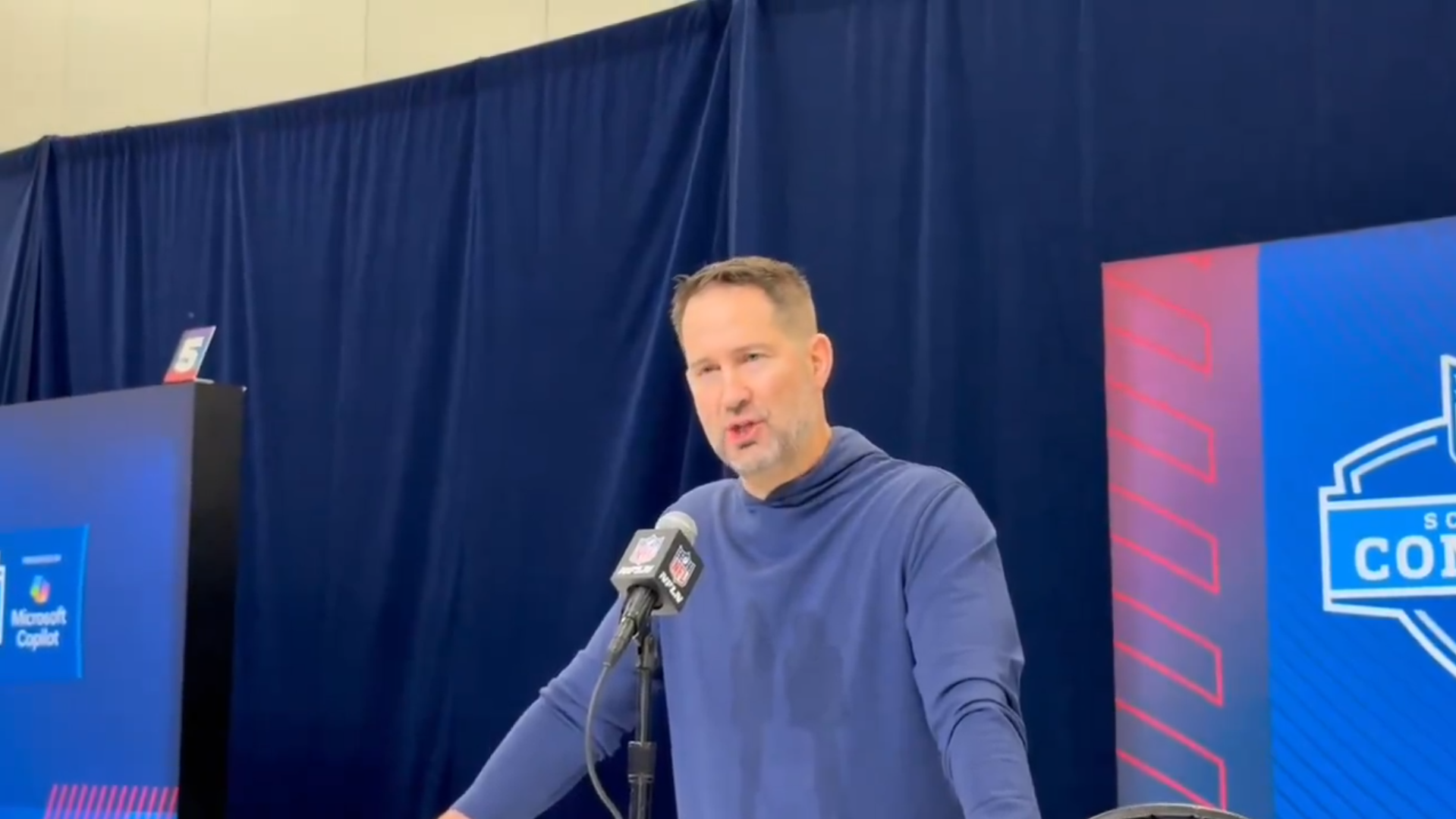Dallas Cowboys HC Brian Schottenheimer speaking at the NFL Scouting Combine.