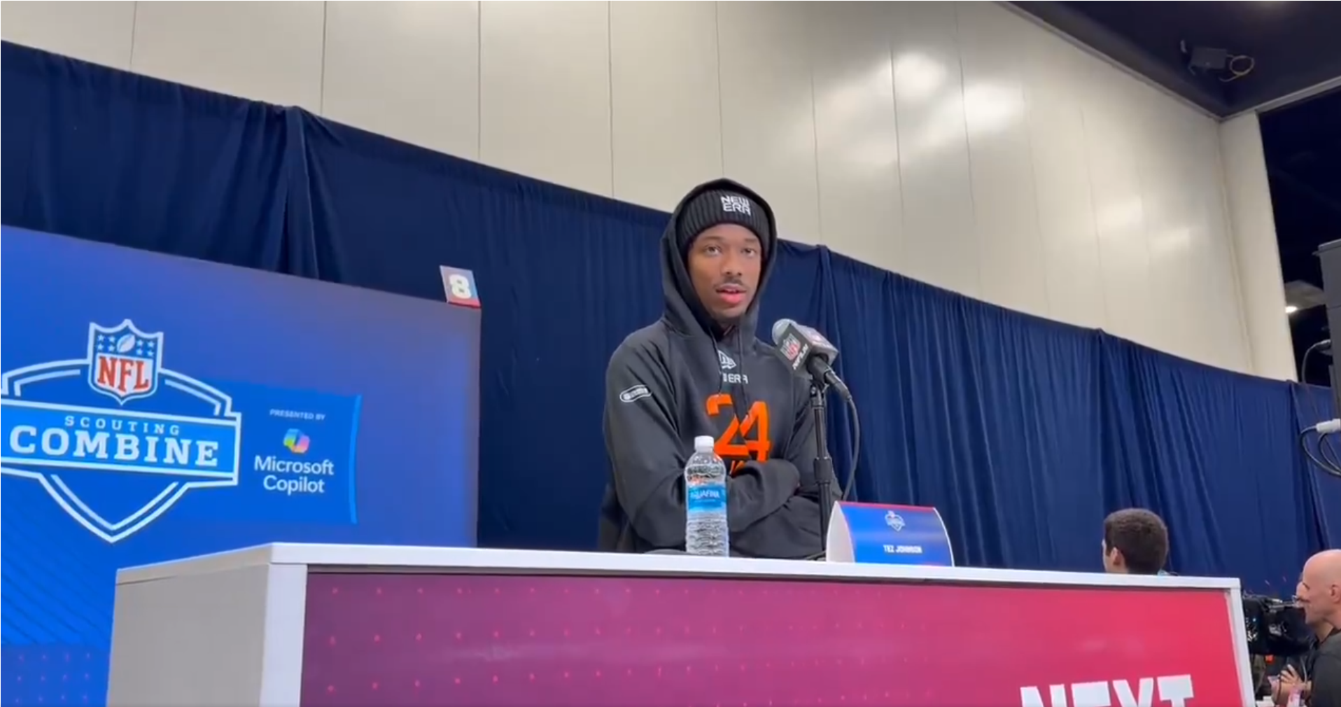 Oregon Ducks WR Tez Johnson talks to reporters at the NFL Scouting Combine.