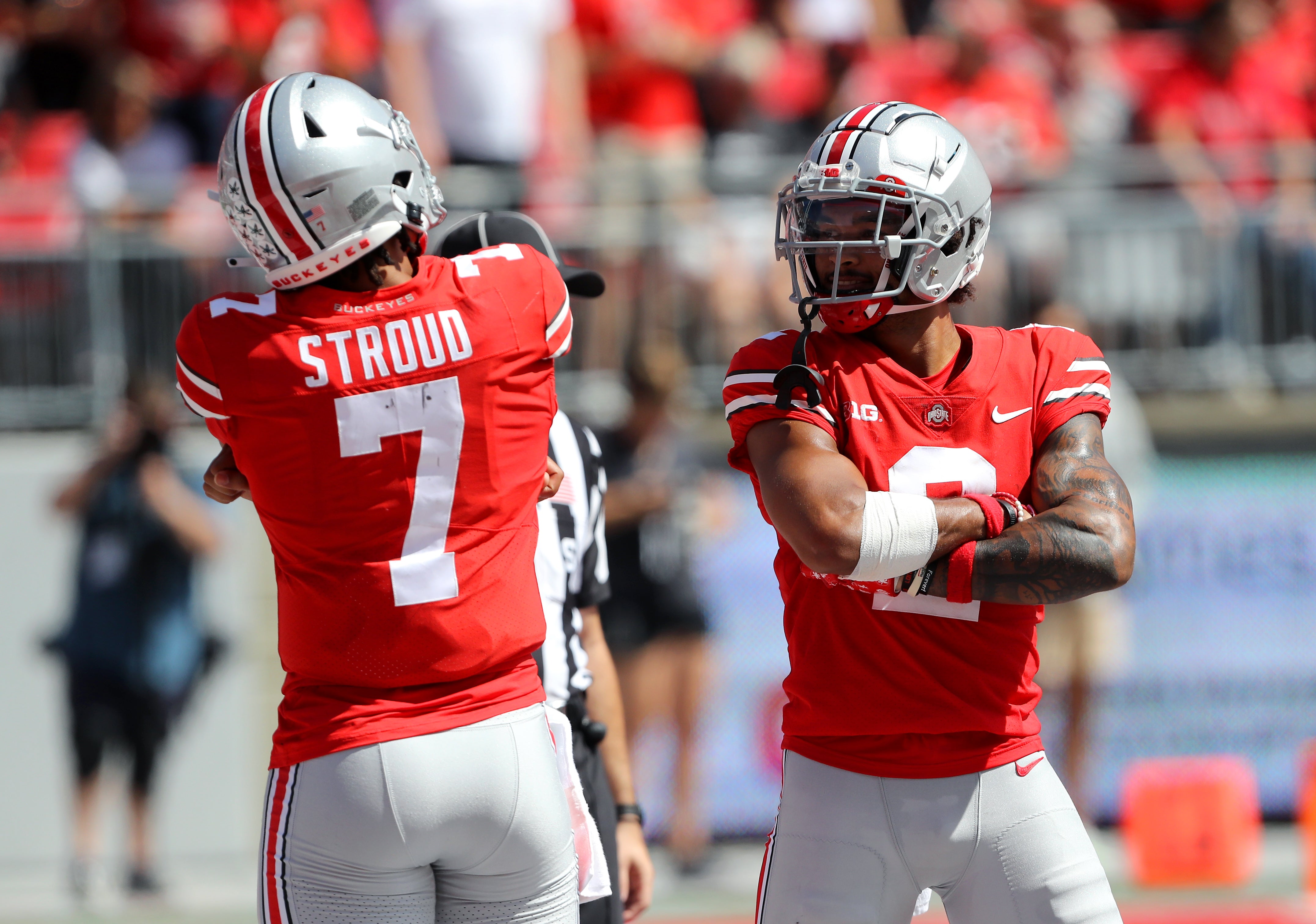 Ohio State Buckeyes wide receiver Emeka Egbuka (2) celebrates his touchdown with quarterback C.J. Stroud (7) during the second half against the Arkansas State Red Wolves at Ohio Stadium.