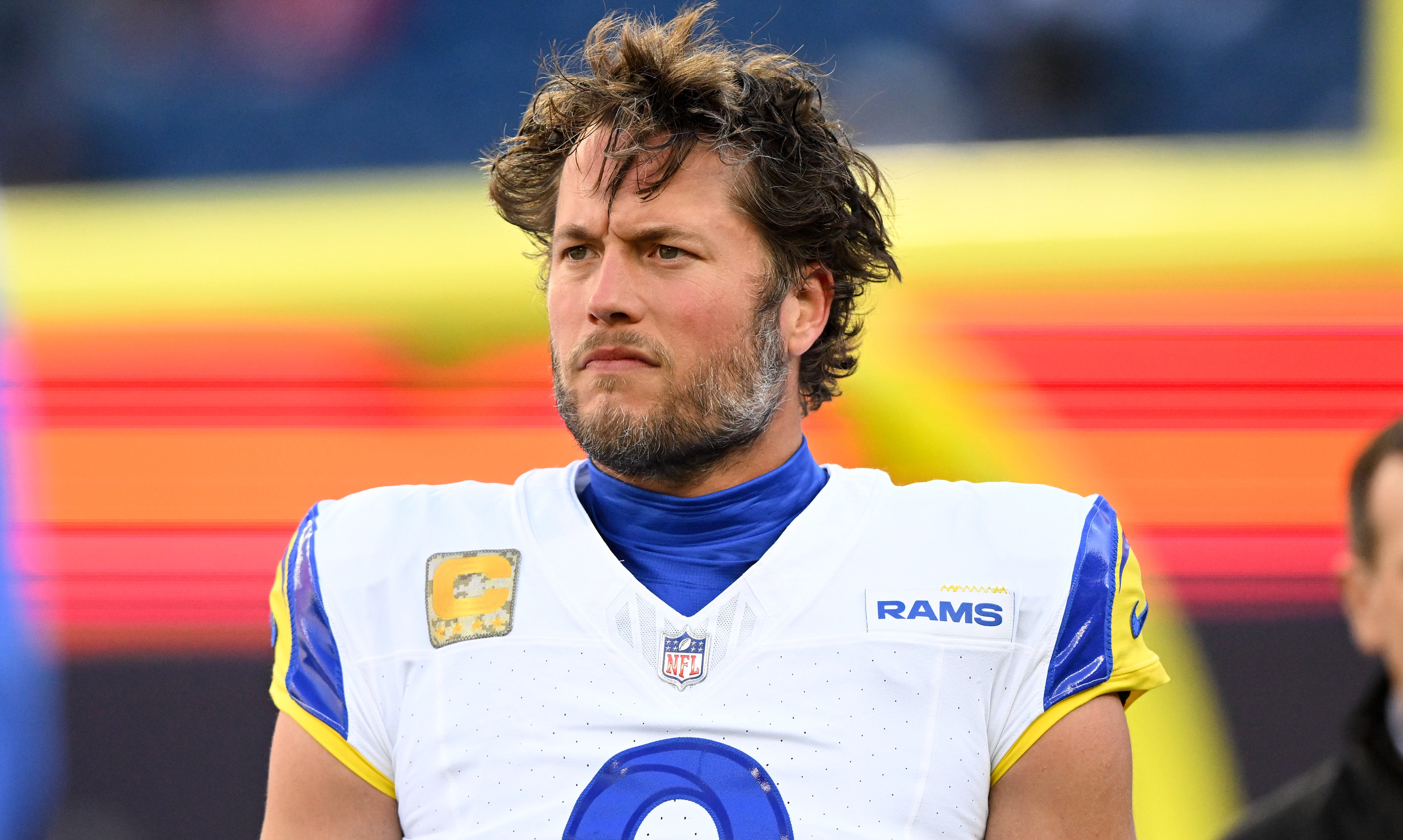 Los Angeles Rams quarterback Matthew Stafford (9) walks onto the field before a game against the New England Patriots at Gillette Stadium. Brian Fluharty-Imagn Images