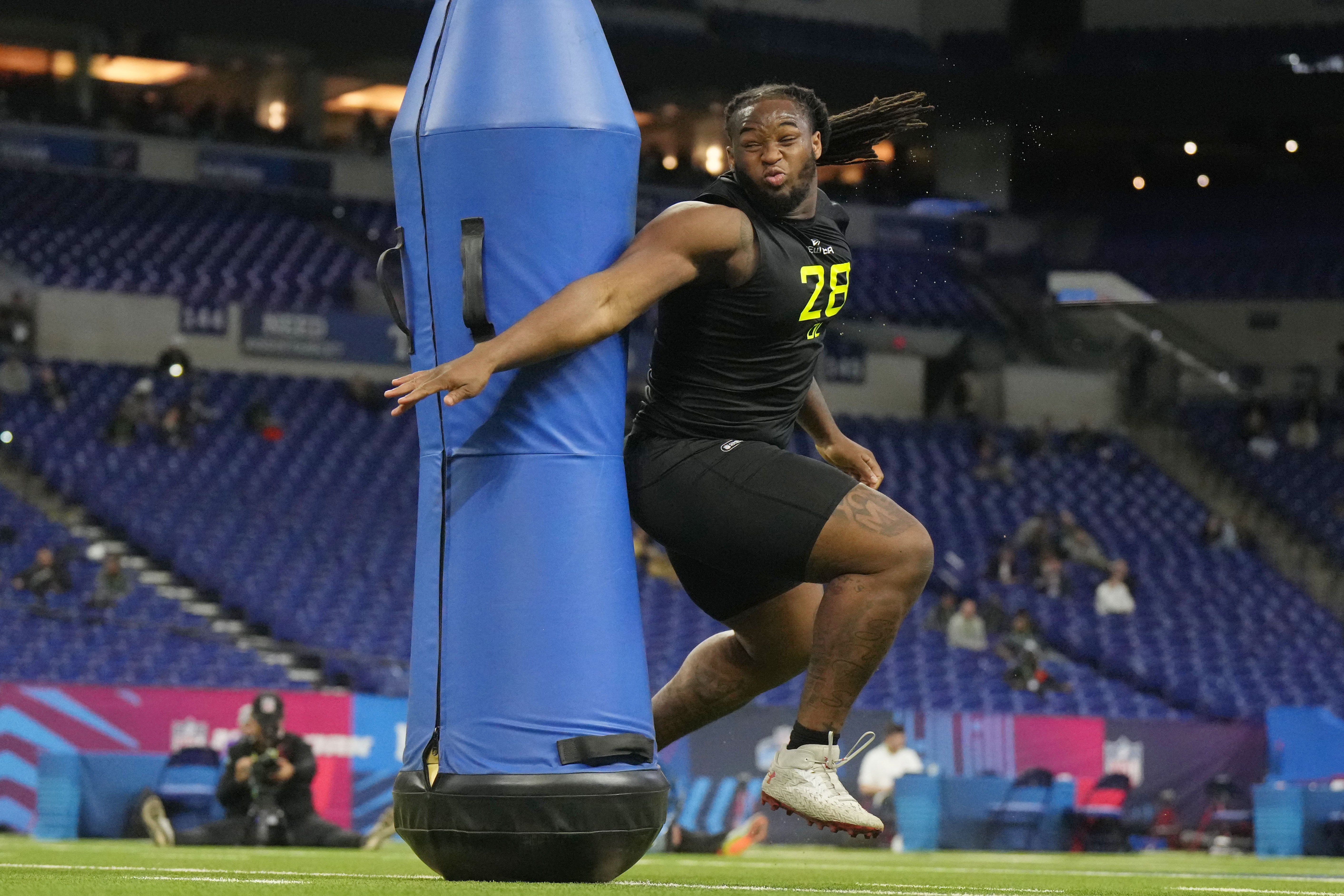 Feb 27, 2025; Indianapolis, IN, USA; Maryland defensive lineman Jordan Phillips (DL28) participates in drills during the 2025 NFL Combine at Lucas Oil Stadium.