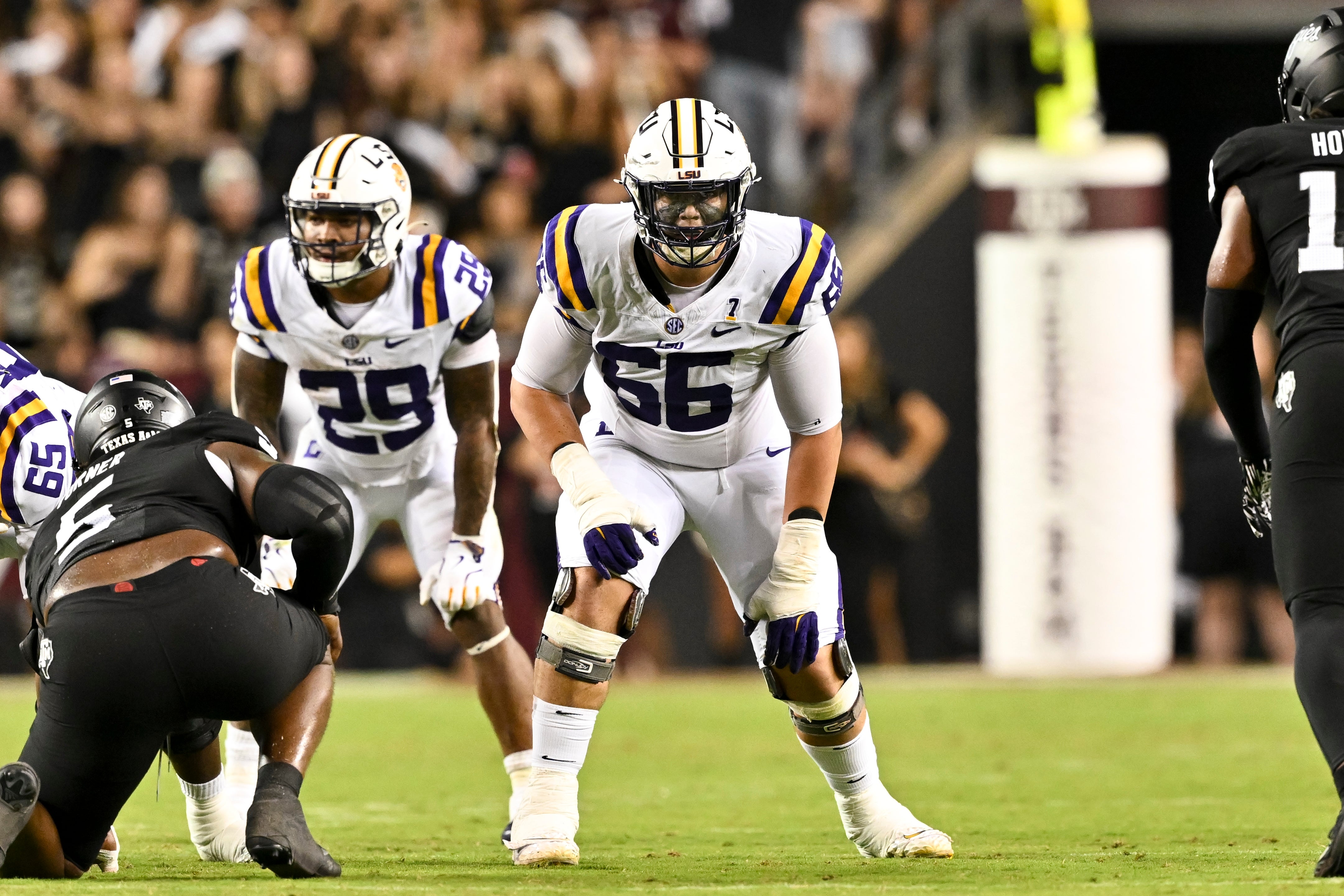 Oct 26, 2024; College Station, Texas, USA; LSU Tigers offensive tackle Will Campbell (66) lines up during the second half against the Texas A&M Aggies. The Aggies defeated the Tigers 38-23; at Kyle Field.