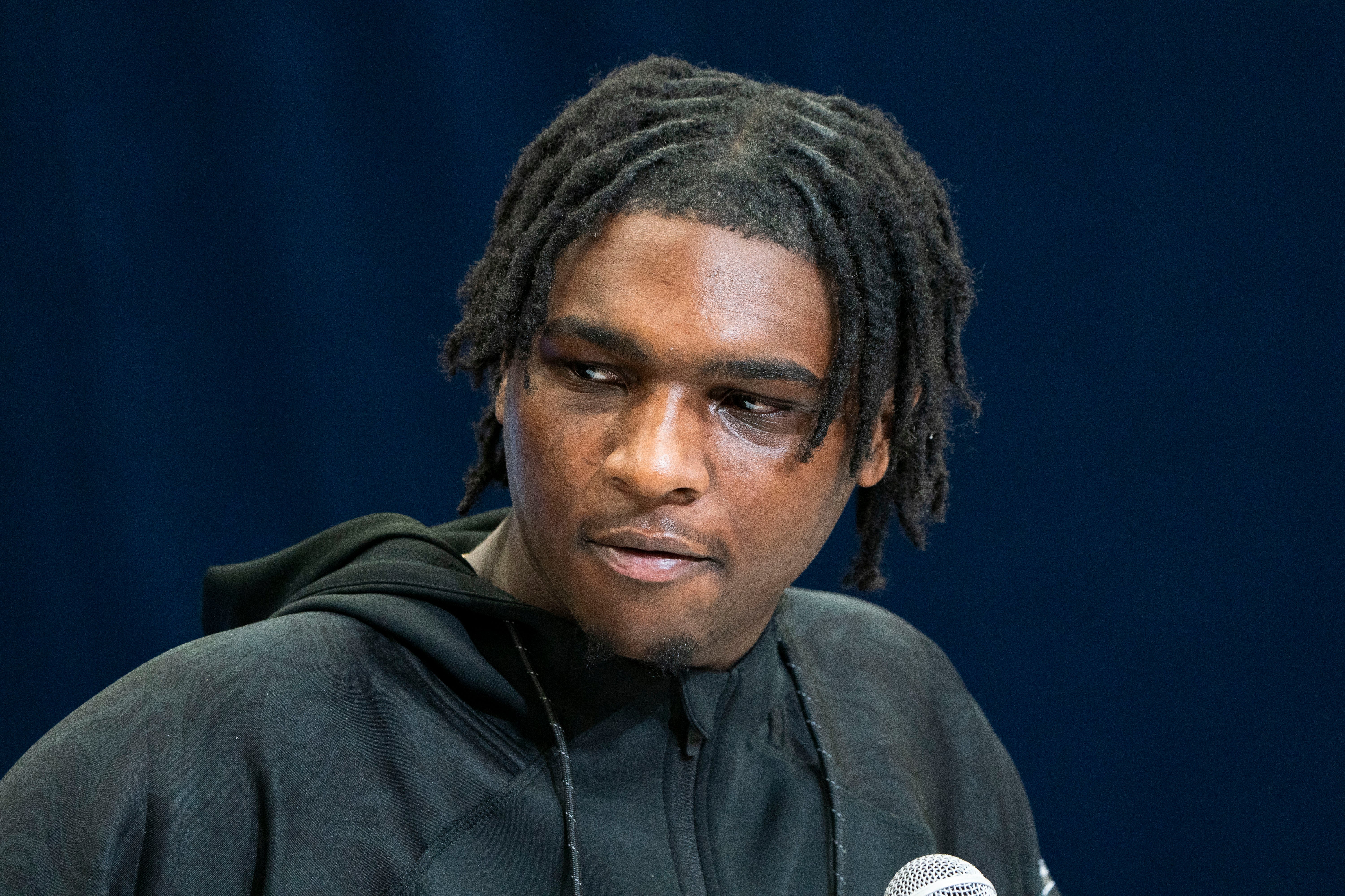Feb 28, 2025; Indianapolis, IN, USA;Miami quarterback Cam Ward (QB15) talks to the press during the 2025 NFL Combine at Indiana Convention Center.