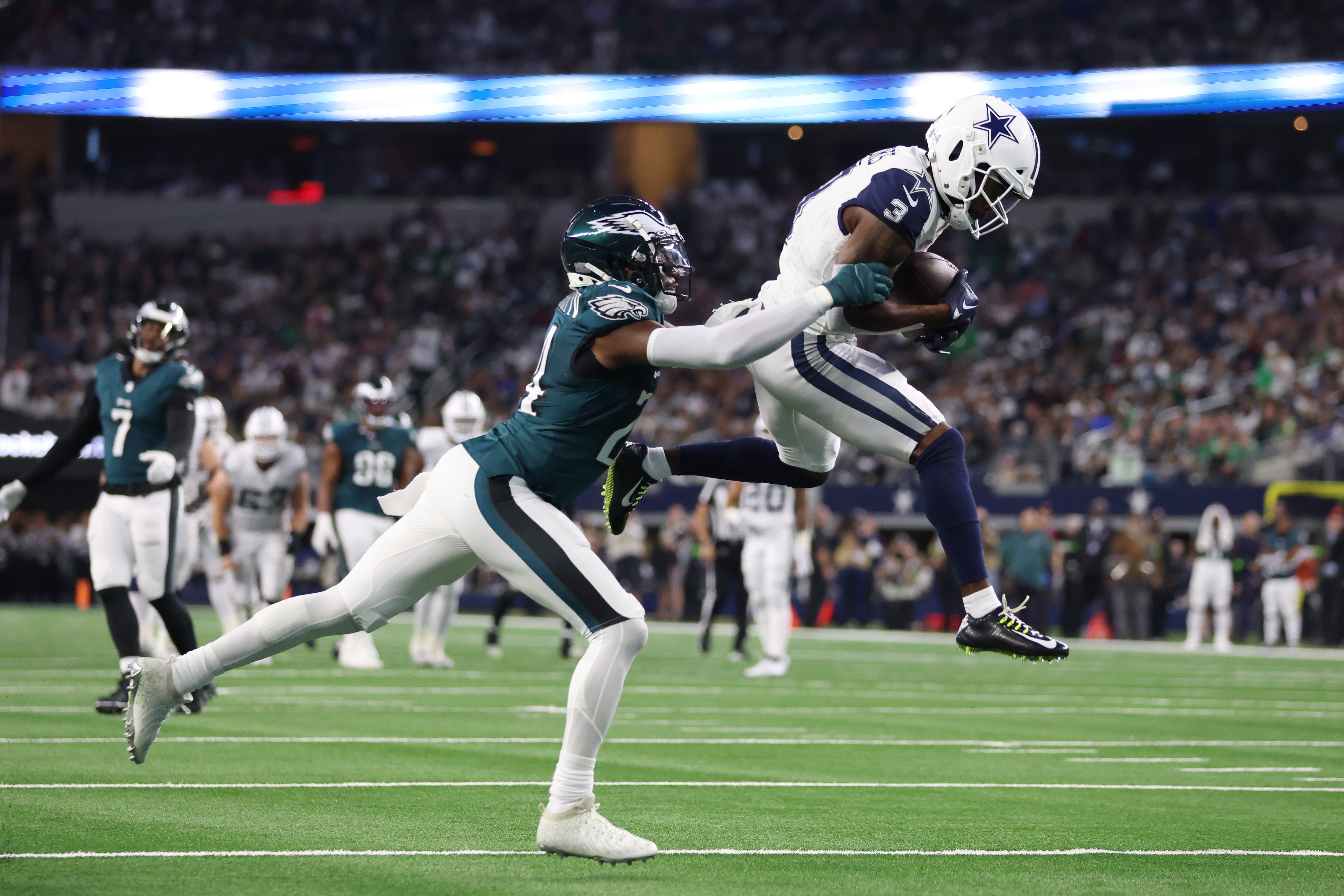 Dallas Cowboys wide receiver Brandin Cooks (3) catches a pass against Philadelphia Eagles cornerback James Bradberry (24) in the second quarter at AT&T Stadium.