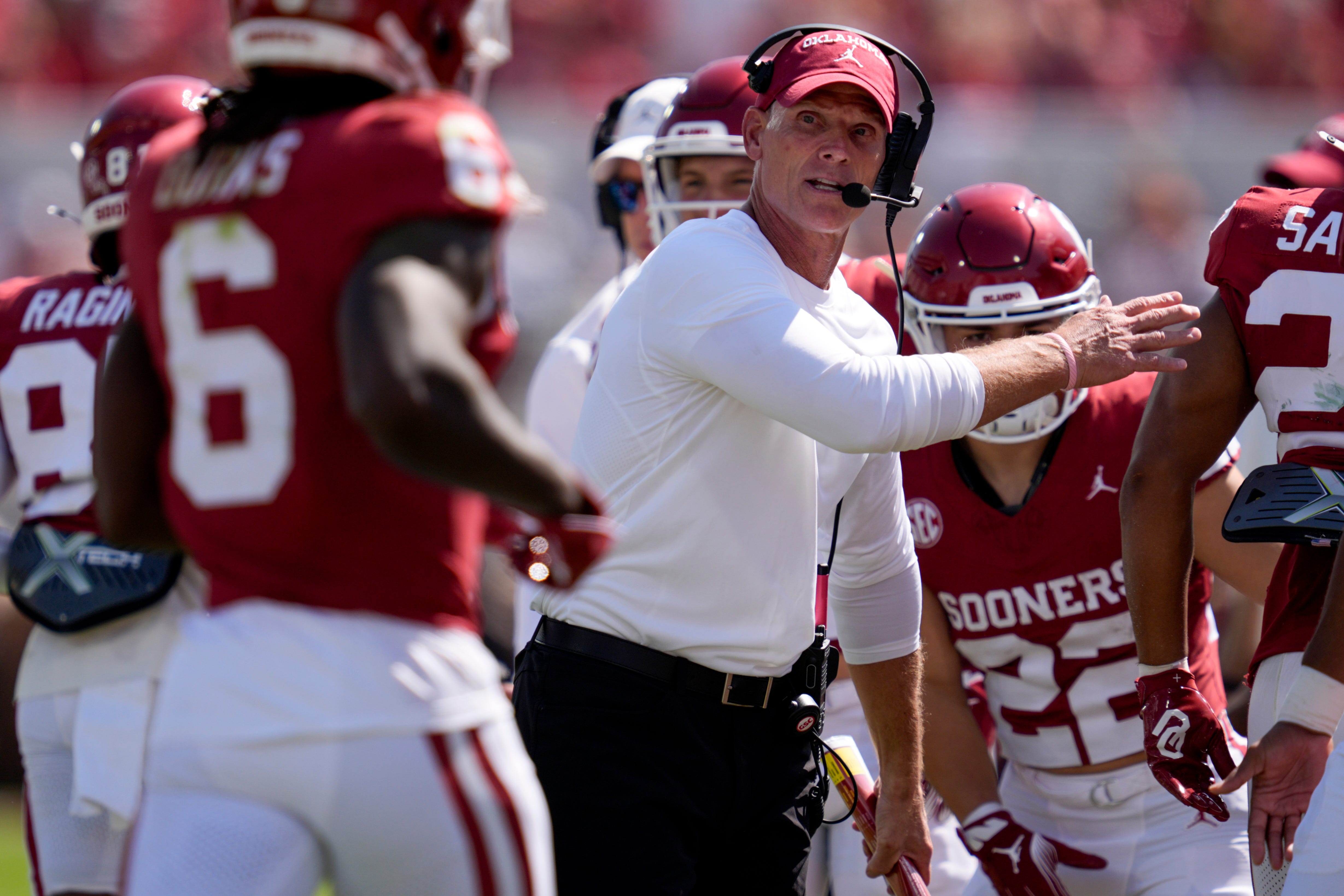 Oklahoma coach Brent Venables greets payers after a touchdown during a college football game between the University of Oklahoma Sooners (OU) and the Tulane Green Wave at Gaylord Family - Oklahoma Memorial Stadium in Norman, Okla., Saturday, Sept. 14, 2024.