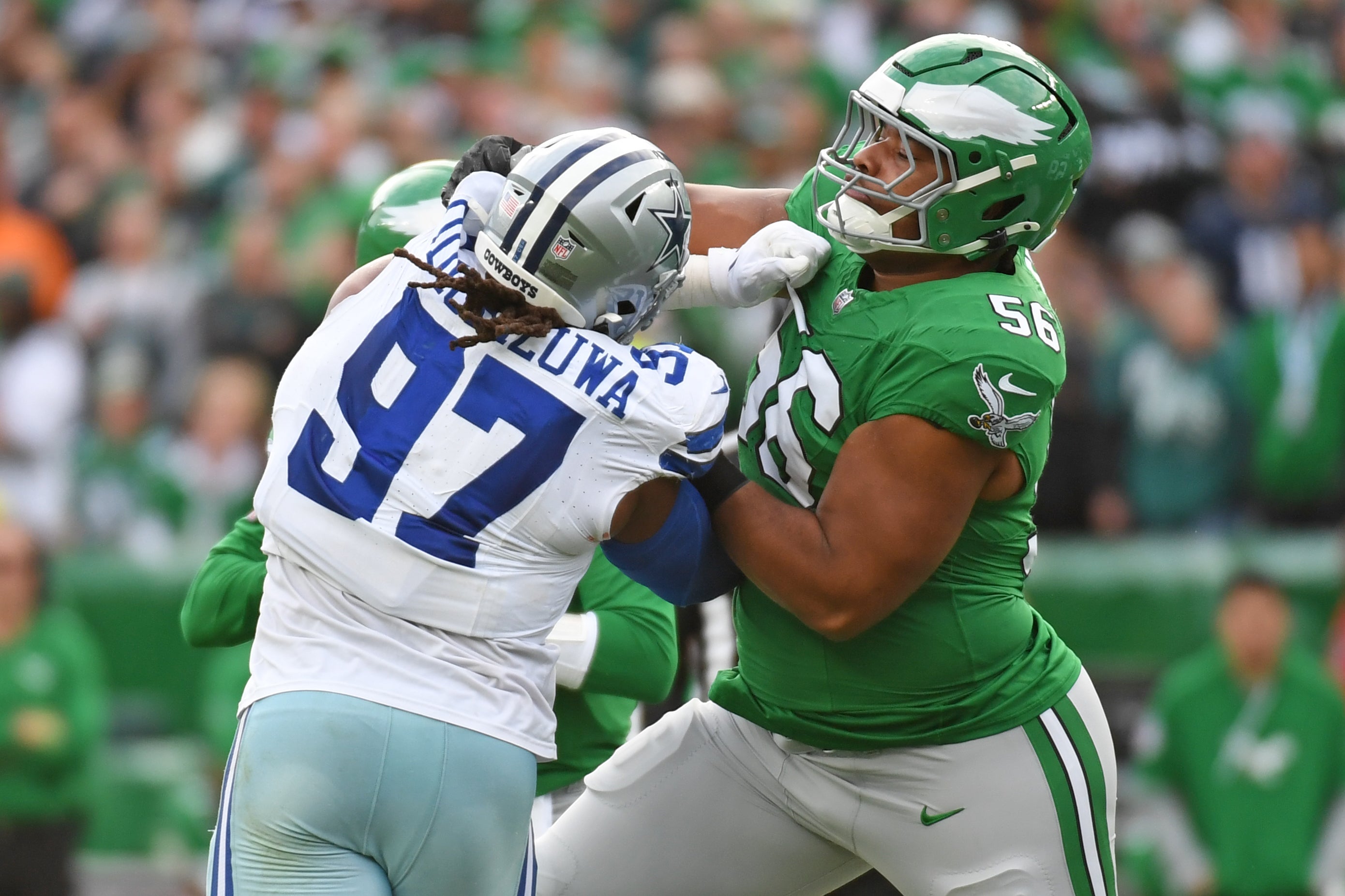 Dec 29, 2024; Philadelphia, Pennsylvania, USA; Philadelphia Eagles guard Tyler Steen (56) blocks Dallas Cowboys defensive tackle Osa Odighizuwa (97) at Lincoln Financial Field.