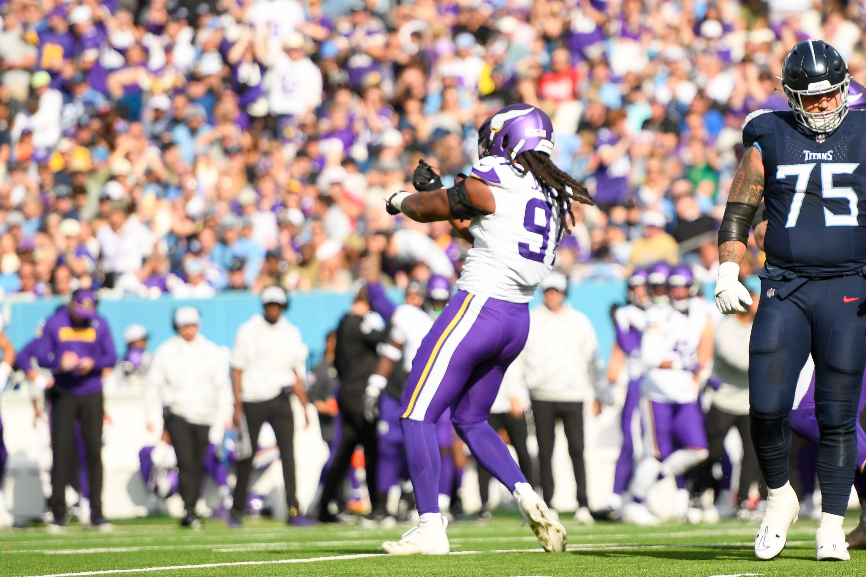 Nov 17, 2024; Nashville, Tennessee, USA; Minnesota Vikings linebacker Pat Jones II (91) celebrates his sack against Tennessee Titans Will Levis (8) during the first half at Nissan Stadium.