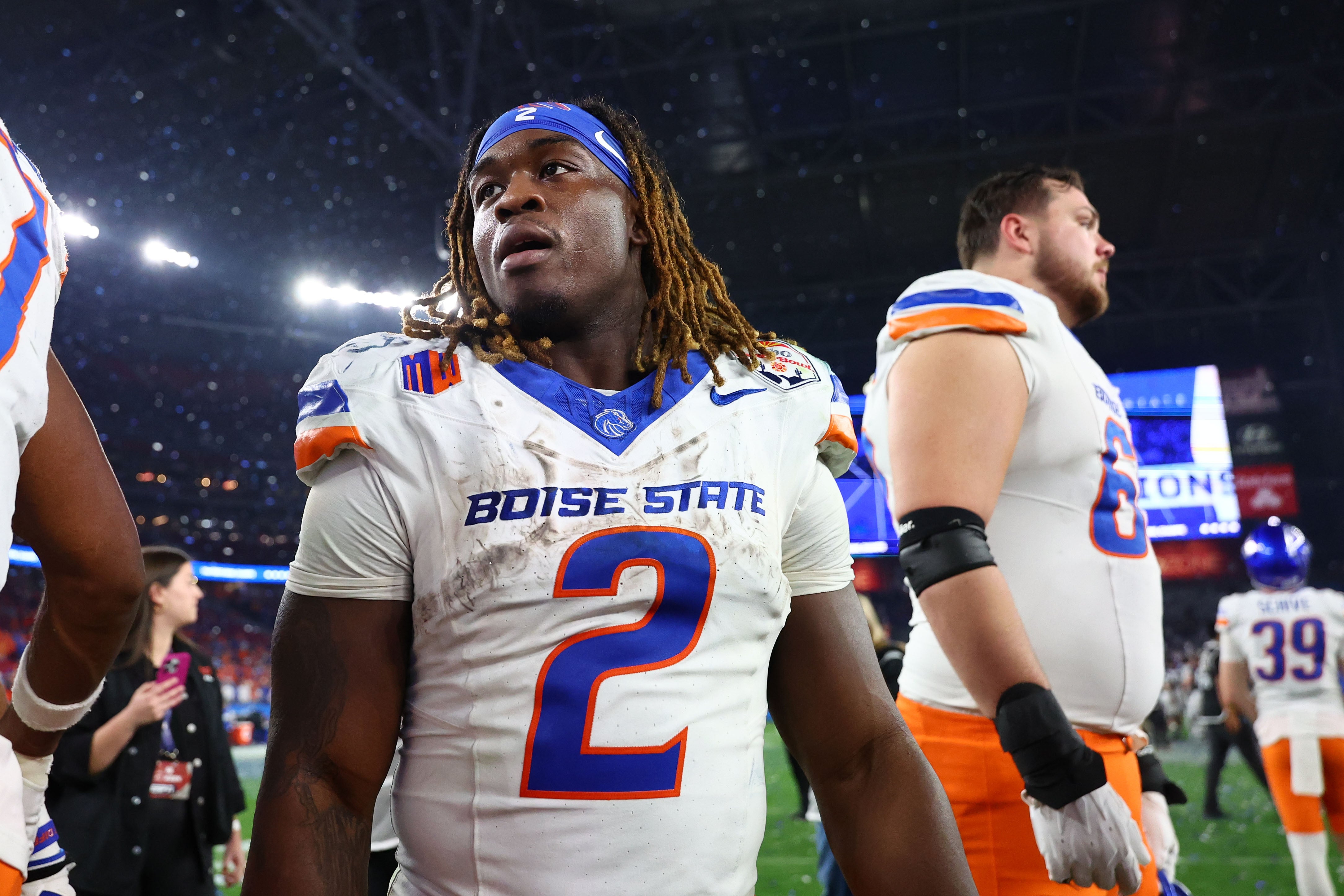 Dec 31, 2024; Glendale, AZ, USA; Boise State Broncos running back Ashton Jeanty (2) reacts after the game against the Penn State Nittany Lions in the Fiesta Bowl at State Farm Stadium.