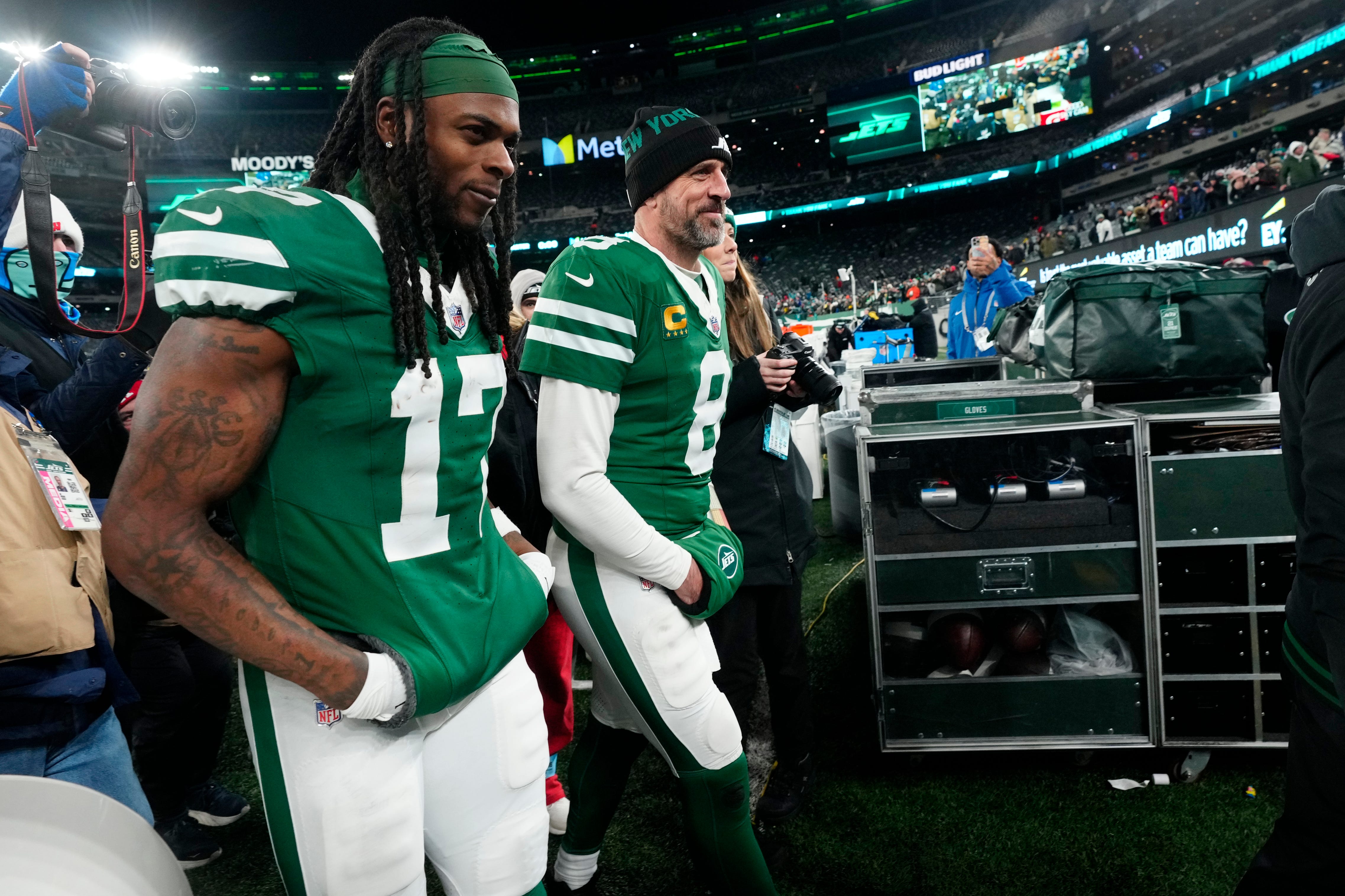 New York Jets wide receiver Davante Adams (17) and New York Jets quarterback Aaron Rodgers (8) are shown as they get ready to step off the field at MetLife Stadium, Sunday January 5, 2025, in East Rutherford.