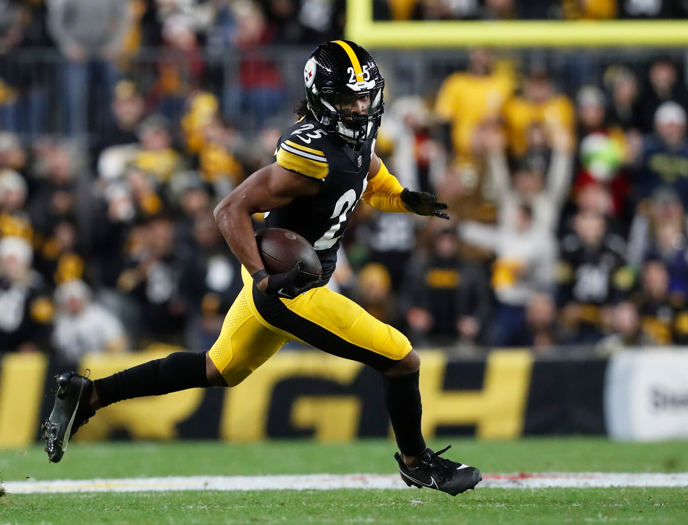 Dec 23, 2023; Pittsburgh, Pennsylvania, USA; Pittsburgh Steelers safety Eric Rowe (25) returns an interception against the Cincinnati Bengals during the second quarter at Acrisure Stadium.