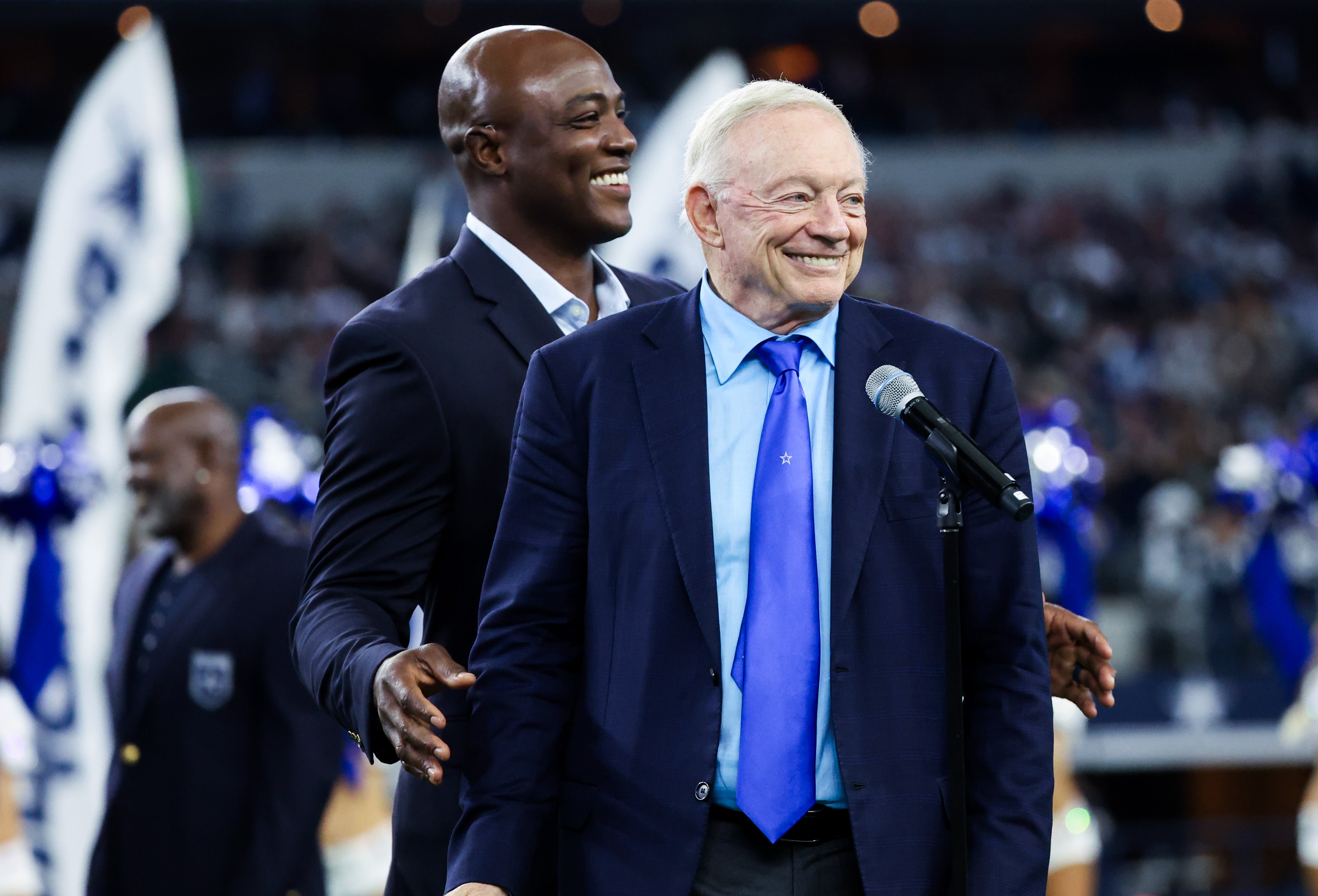 Dallas Cowboys owner Jerry Jones introduces former player Demarcus Ware into the Ring of Honor during halftime of the game against the Los Angeles Rams at AT&T Stadium.