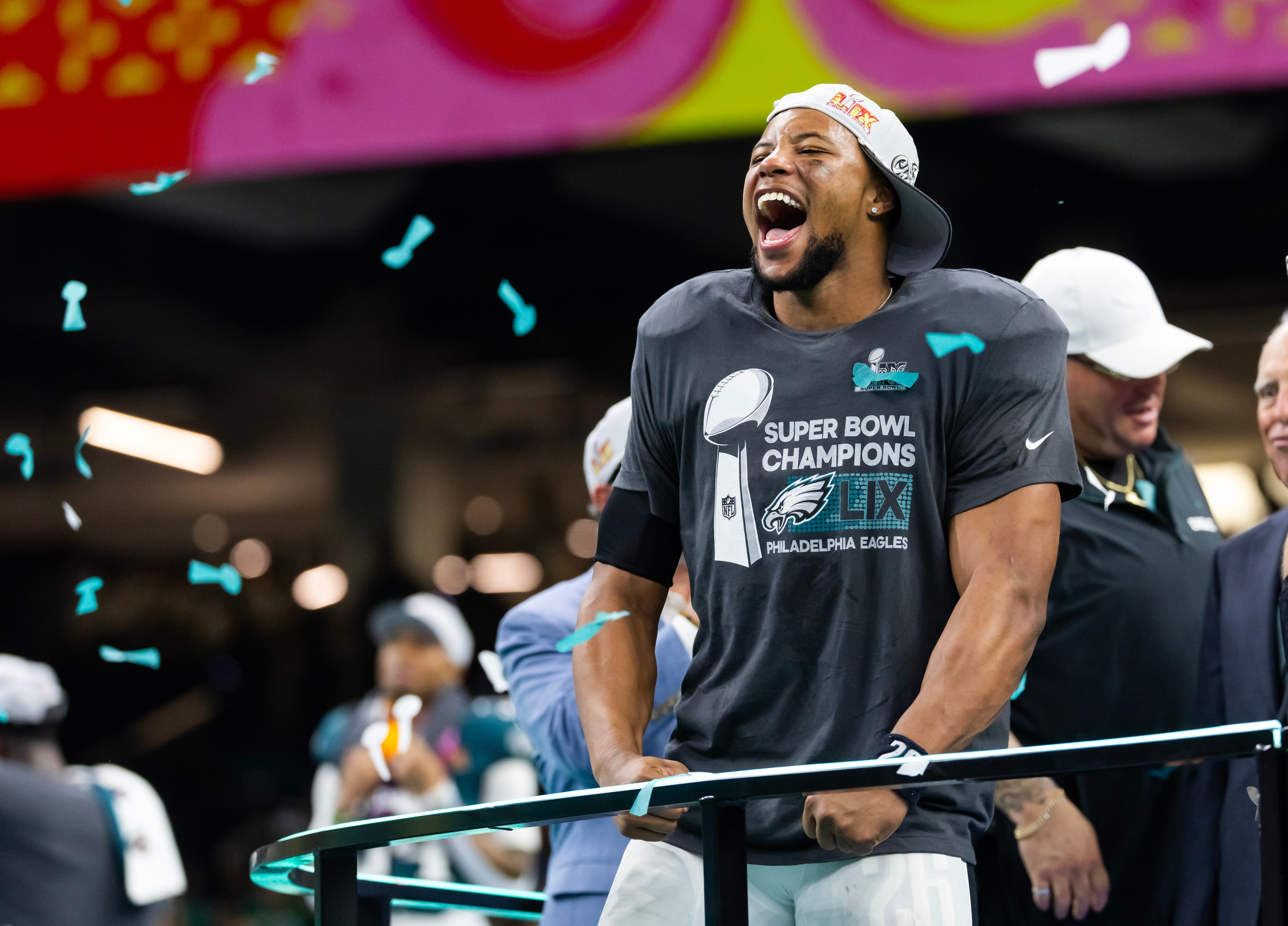 Philadelphia Eagles running back Saquon Barkley (26) celebrates after defeating the Kansas City Chiefs during Super Bowl LIX at Ceasars Superdome.