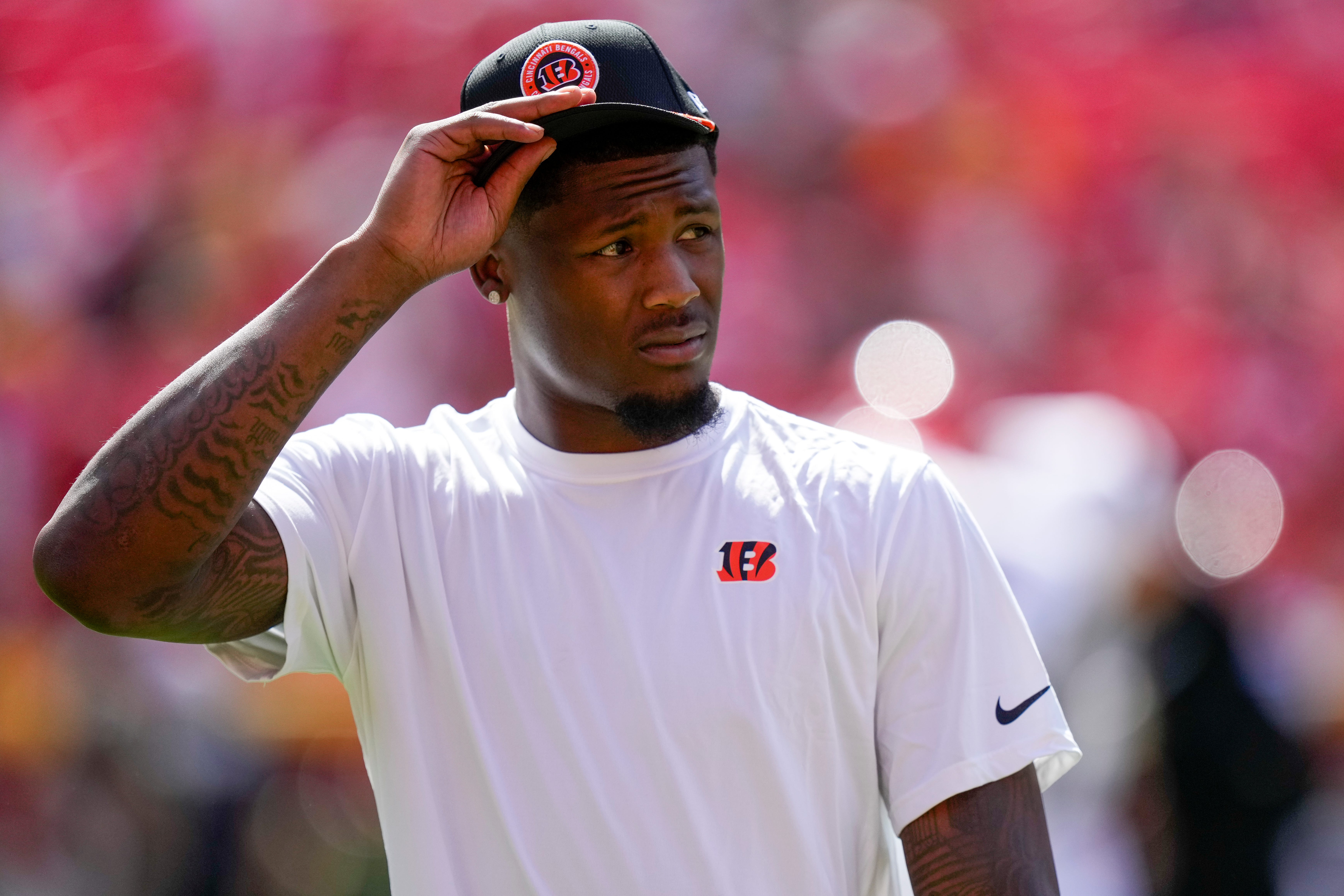 Injured Cincinnati Bengals wide receiver Tee Higgins (5) walks the field before the first quarter of the NFL Week 2 game between the Kansas City Chiefs and the Cincinnati Bengals at Arrowhead Stadium in Kansas City on Sunday, Sept. 15, 2024. The Bengals led 16-10 at halftime.