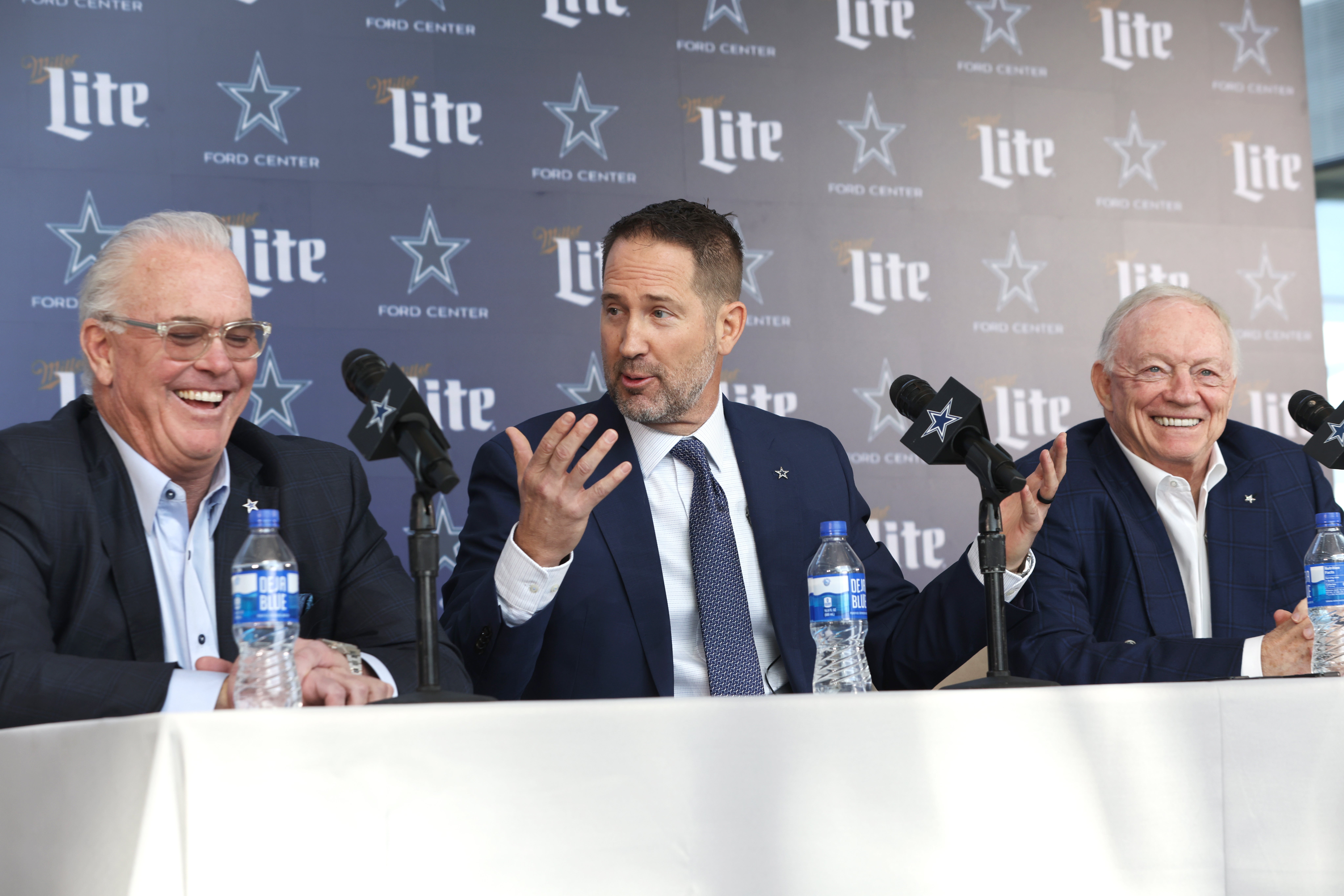 Dallas Cowboys CEO Stephen Jones, head coach Brian Schottenheimer and owner Jerry Jones speak to the media at a press conference at the Star.