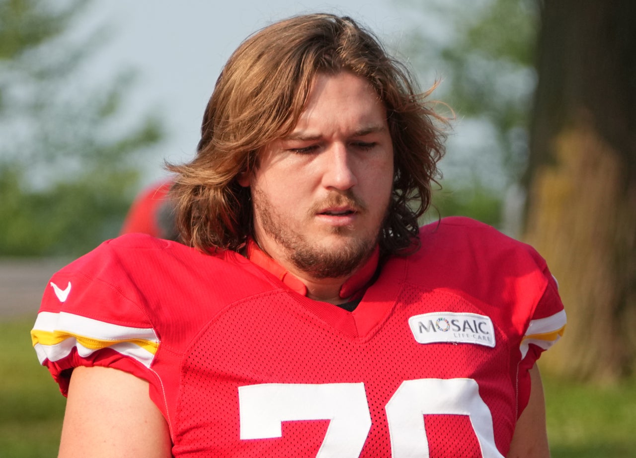 Jul 26, 2024; Kansas City, MO, USA; Kansas City Chiefs guard McKade Mettauer (70) walks from the locker room to the fields prior to training camp at Missouri Western State University.
