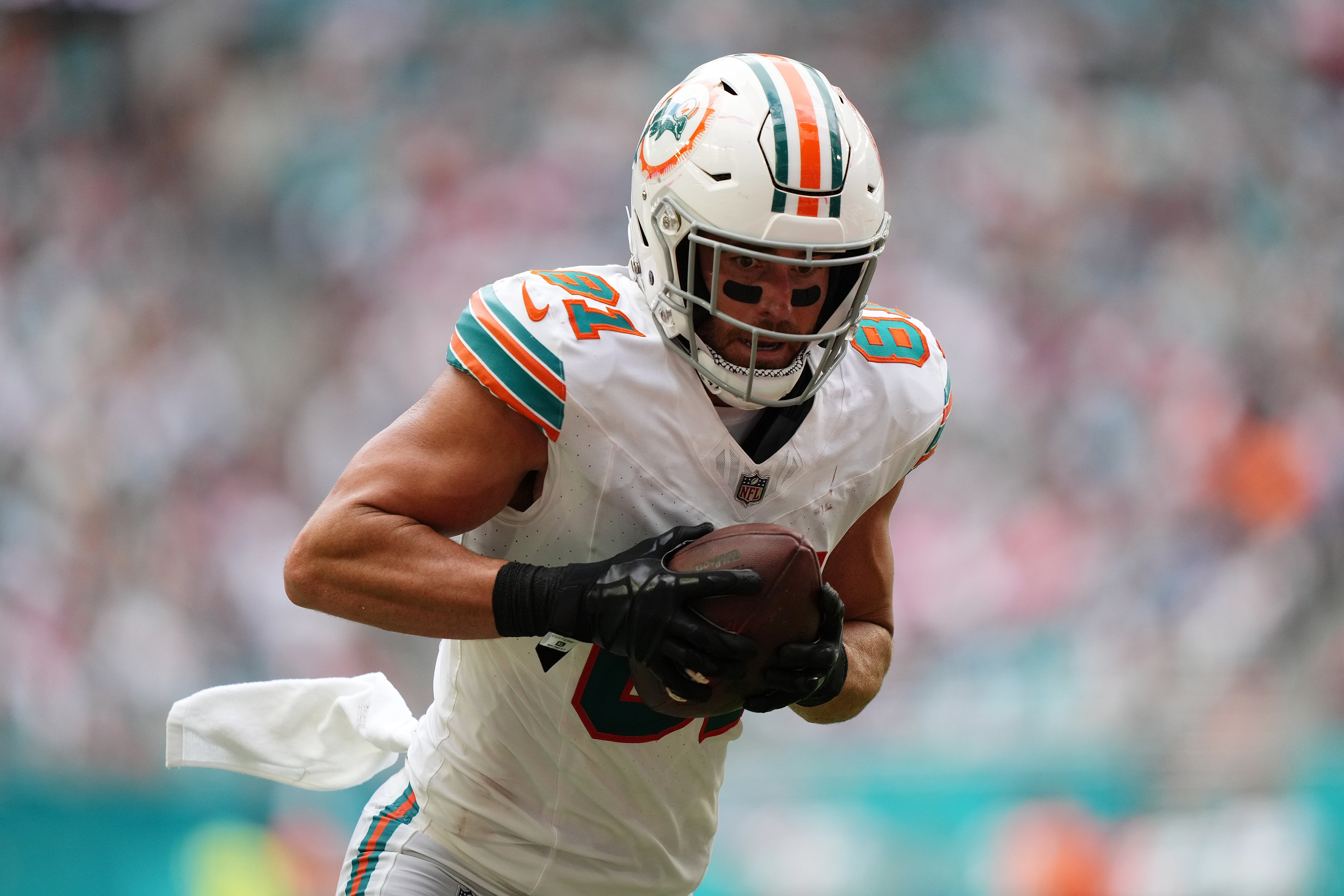 Oct 29, 2023; Miami Gardens, Florida, USA; Miami Dolphins tight end Durham Smythe (81) catches a pass against the New England Patriots during the second half at Hard Rock Stadium.