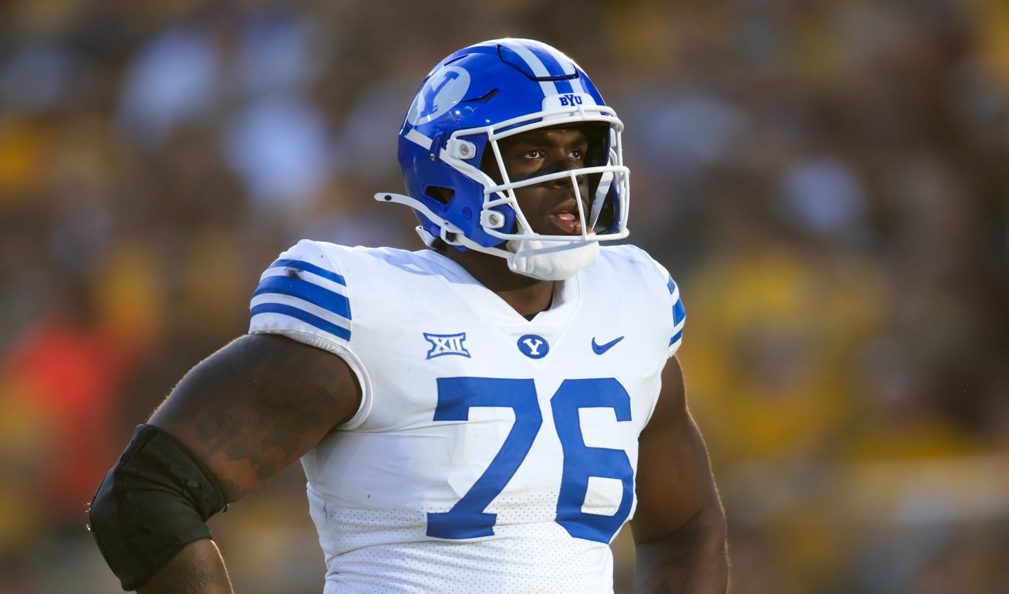 Nov 23, 2024; Tempe, Arizona, USA; Brigham Young Cougars offensive lineman Caleb Etienne (76) against the Arizona State Sun Devils at Mountain America Stadium.