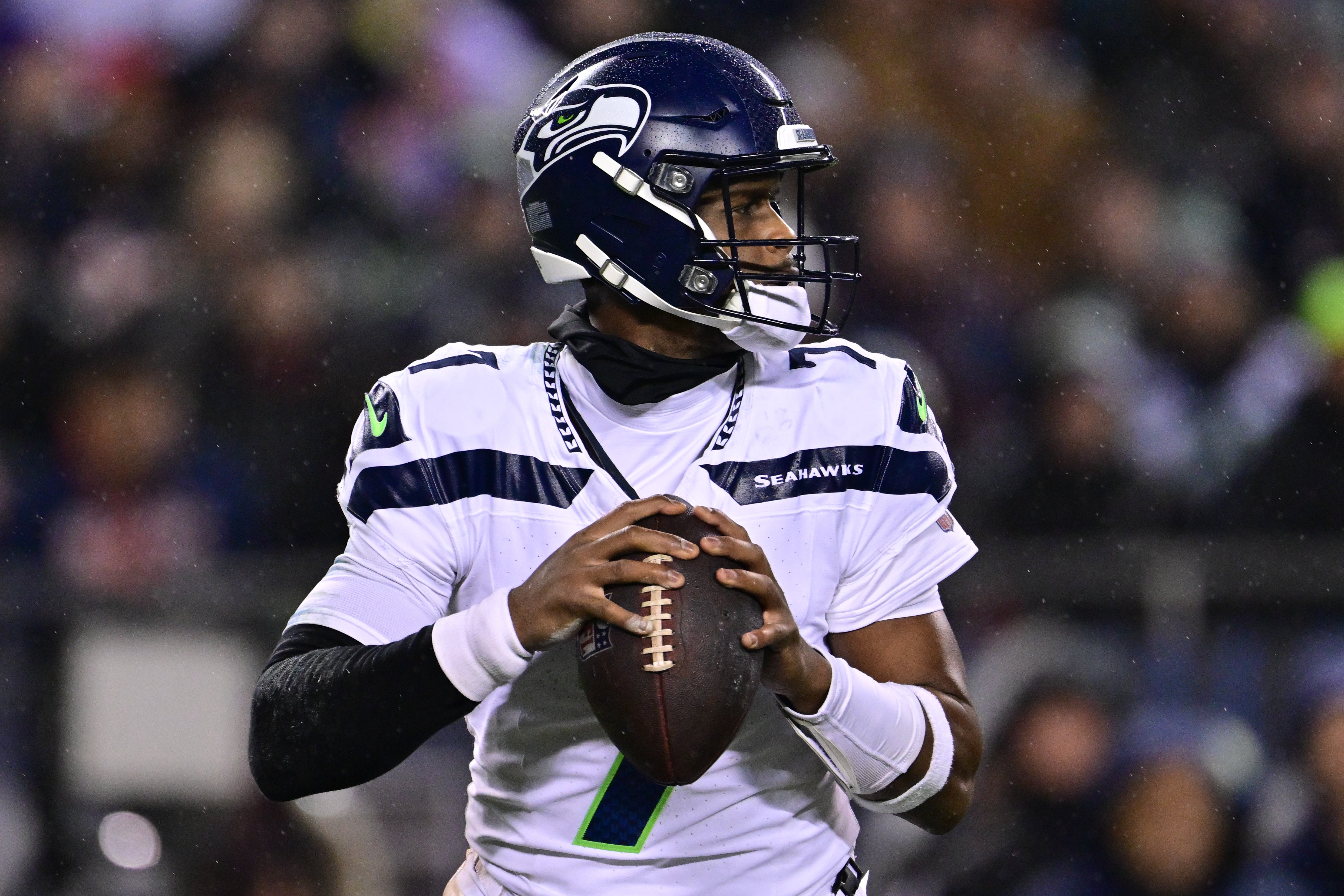 Dec 26, 2024; Chicago, Illinois, USA; Seattle Seahawks quarterback Geno Smith (7) looks to pass against the Chicago Bears during the second quarter at Soldier Field.