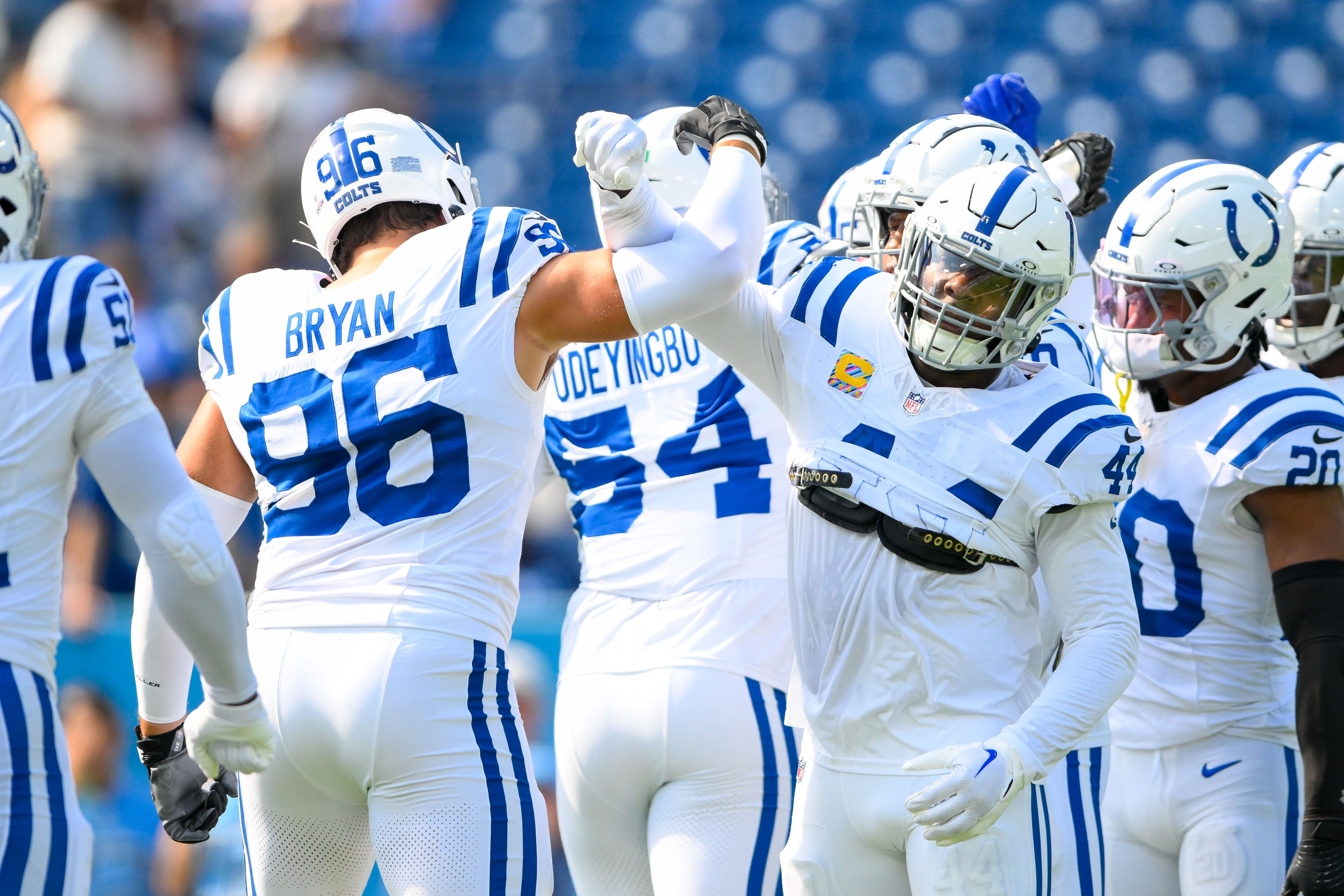 Oct 13, 2024; Nashville, Tennessee, USA; Indianapolis Colts defensive tackle Taven Bryan (96) and linebacker Zaire Franklin (44) get fired up for the game during pregame warmups against the Tennessee Titans at Nissan Stadium.