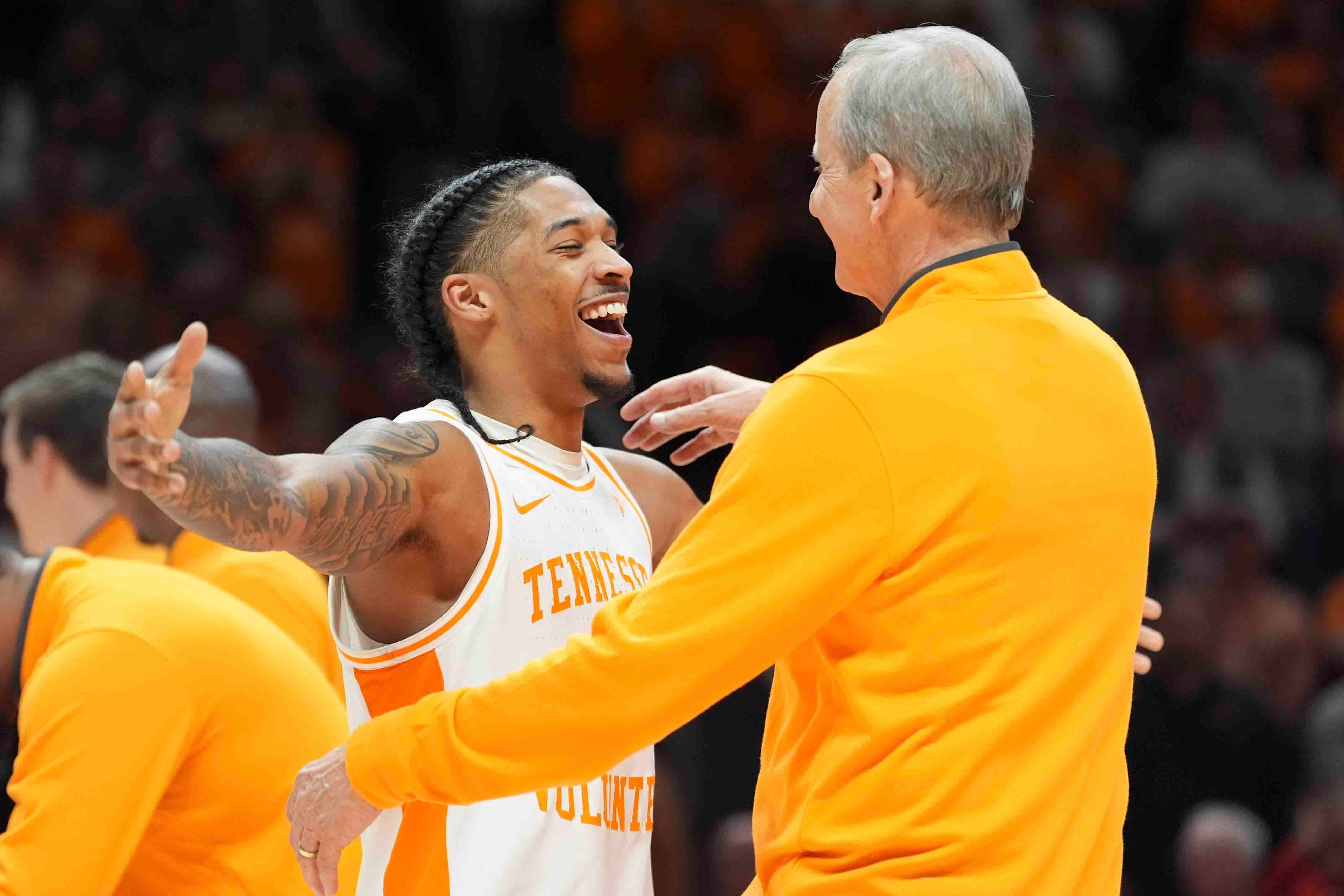 Tennessee's Zakai Zeigler (5) hugs Tennessee head coach Rick Barnes during Senior Day presentations after a men’s college basketball game between Tennessee and South Carolina at Thompson-Boling Arena at Food City Center, Saturday, March 8, 2025.