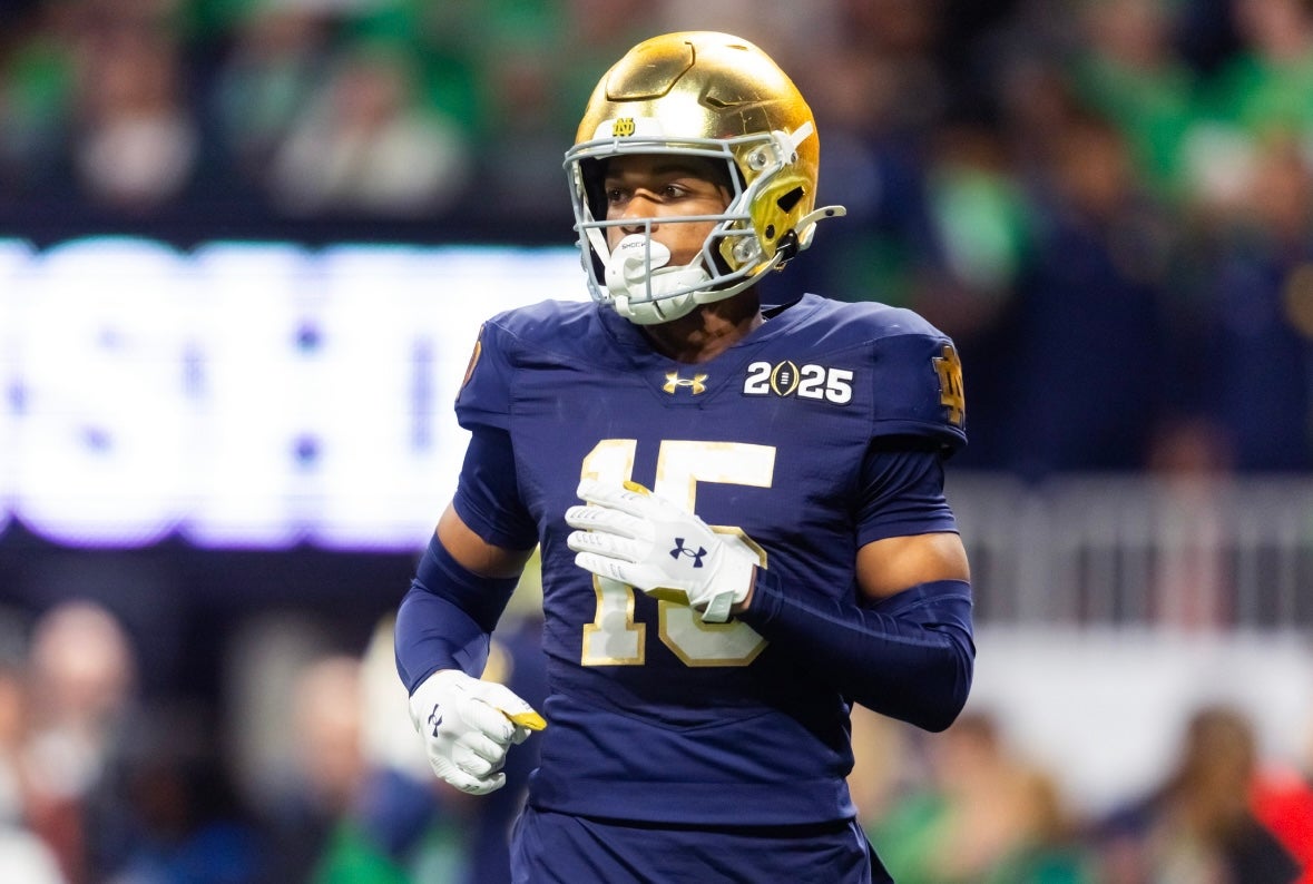 Notre Dame Fighting Irish cornerback Leonard Moore (15) against the Ohio State Buckeyes during the CFP National Championship college football game at Mercedes-Benz Stadium.