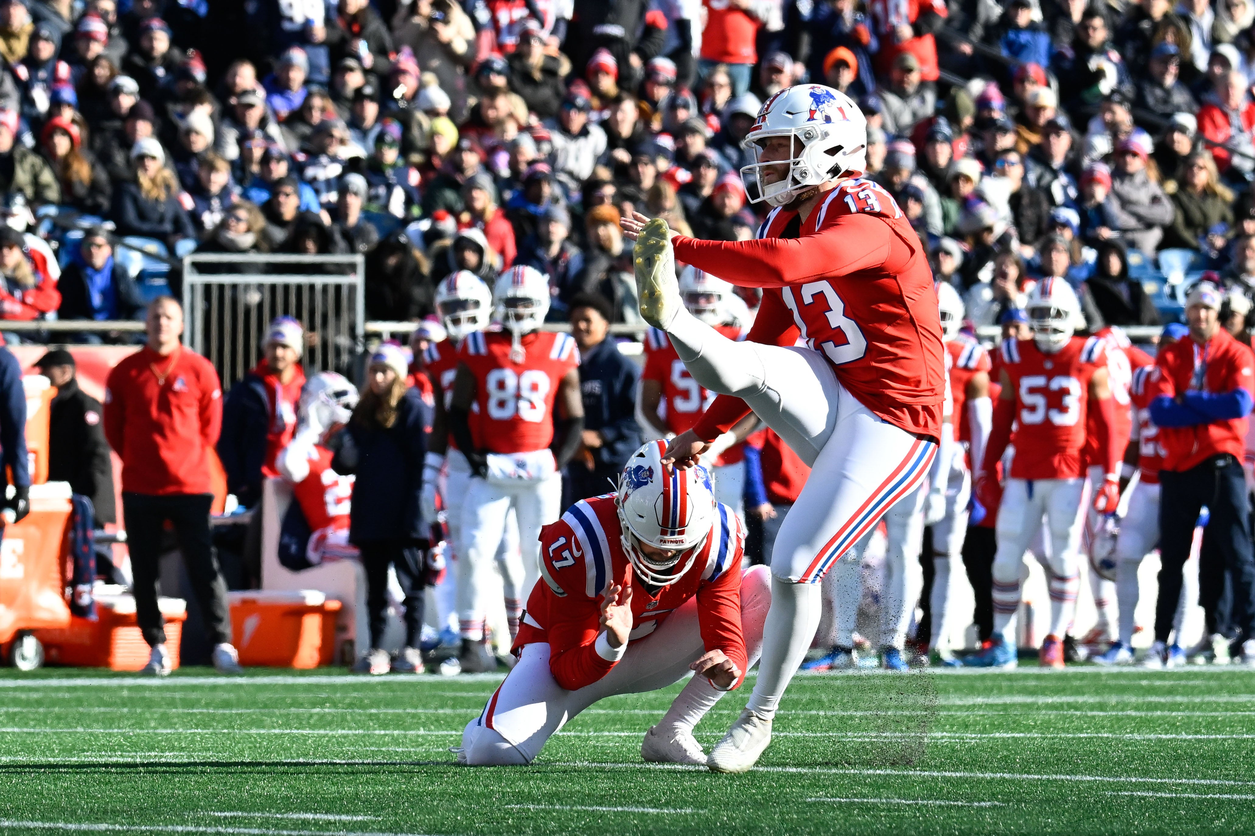 Dec 1, 2024; Foxborough, Massachusetts, USA; New England Patriots place kicker Joey Slye (13) kicks a field goal against the Indianapolis Colts during the first half at Gillette Stadium.
